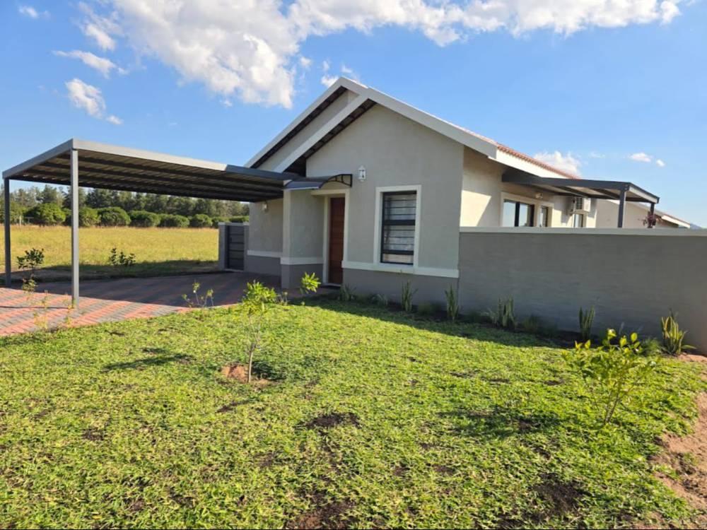 Solana Studio Unit in Hazyview, a single-storey house with a carport and a lawn in De Rust Lifestyle Estate