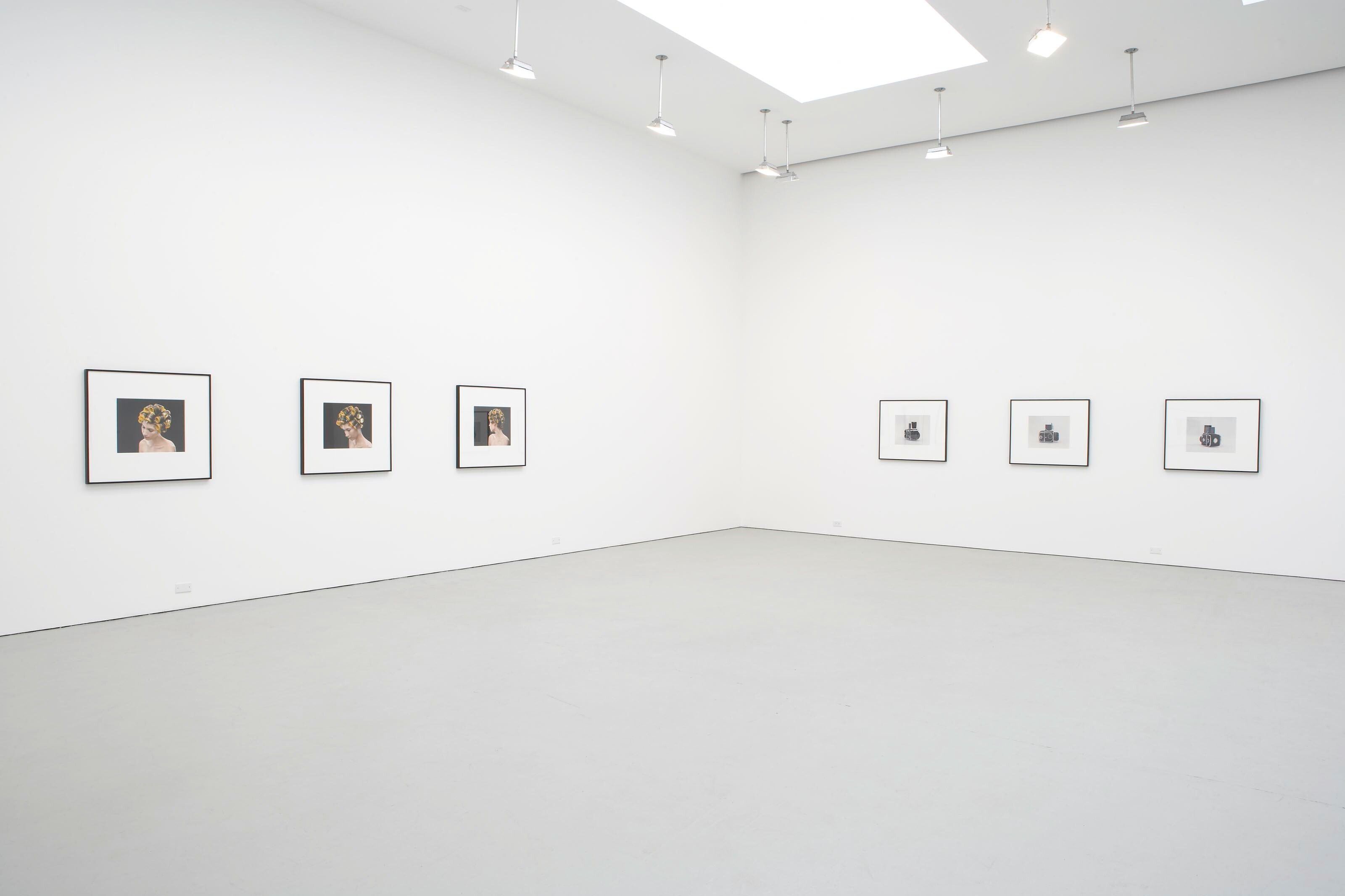 Installation view of the exhibition Christopher Williams: For Example: Dix-Huit Leçons Sur La Société Industrielle (Revision 4), at David Zwirner in New York, dated 2006.