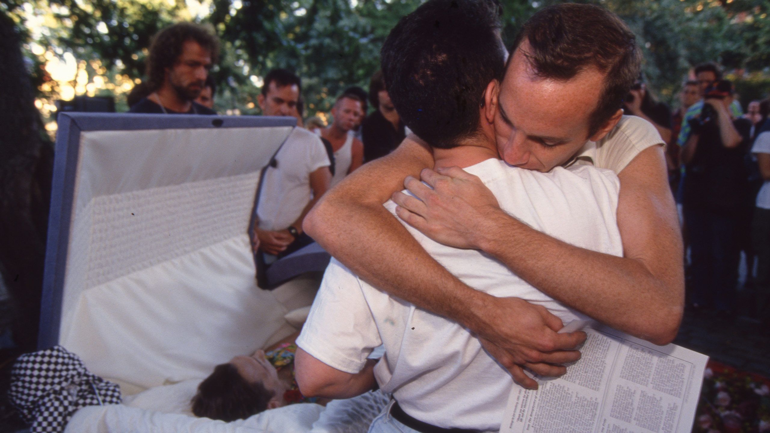 A photo by Donna binder of Jon Greenberg's funeral in Tompkins Square Park, dated 1993.