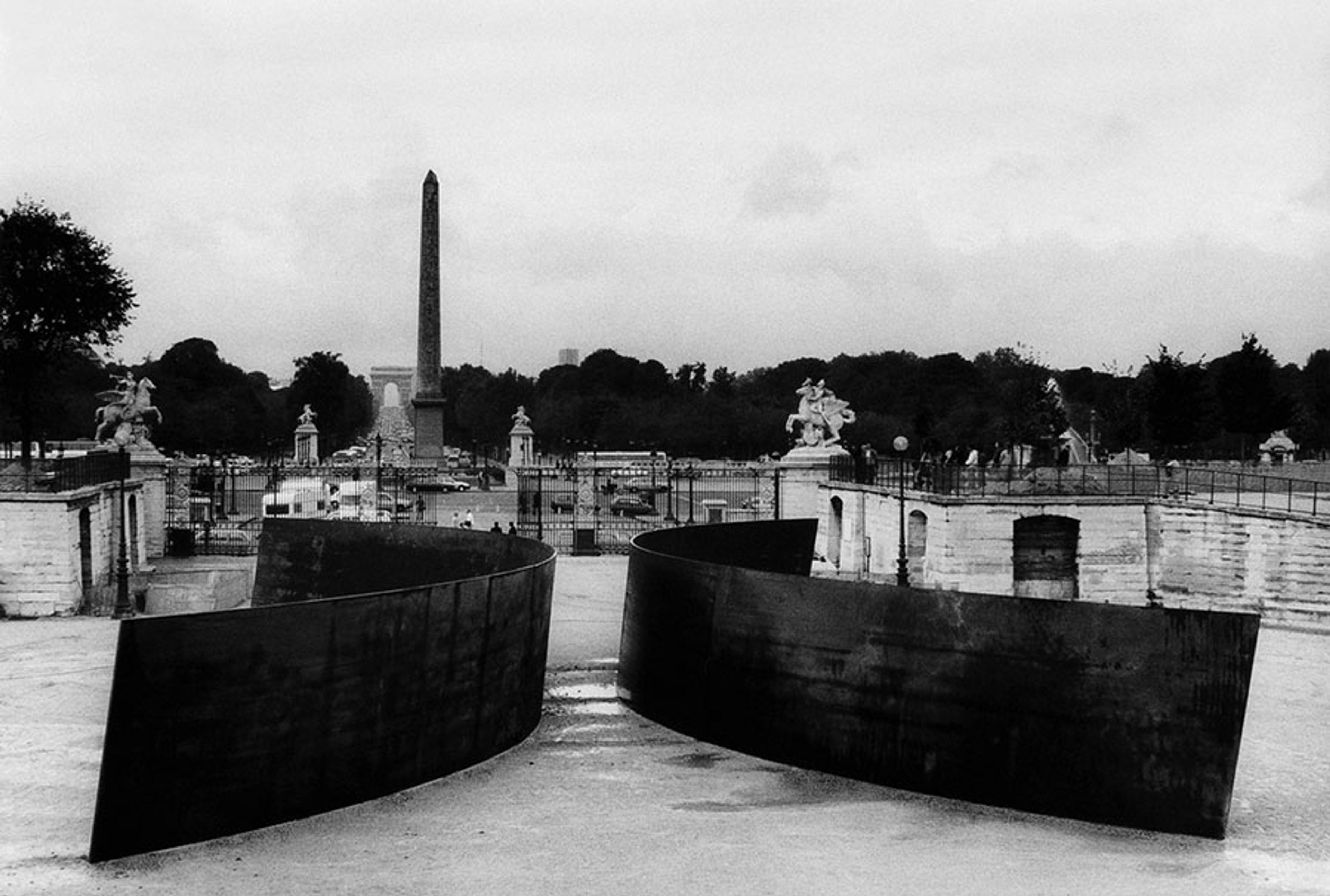 A sculpture by Richard Serra made of two identical conical sections, inverted relative to each other, titled Clara Clara, dated 1983.