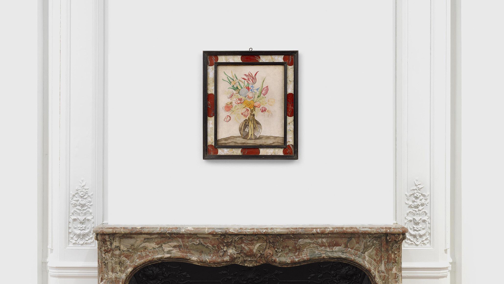 An installation view of a painting by Giovanna Garzoni, titled Still life of flowers in a glass vase, dated circa 1640-1650.