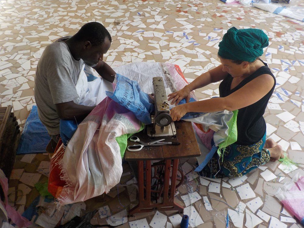 A photograph of Dana Louis with Ibrahima Ba, by unknown, dated 2016.