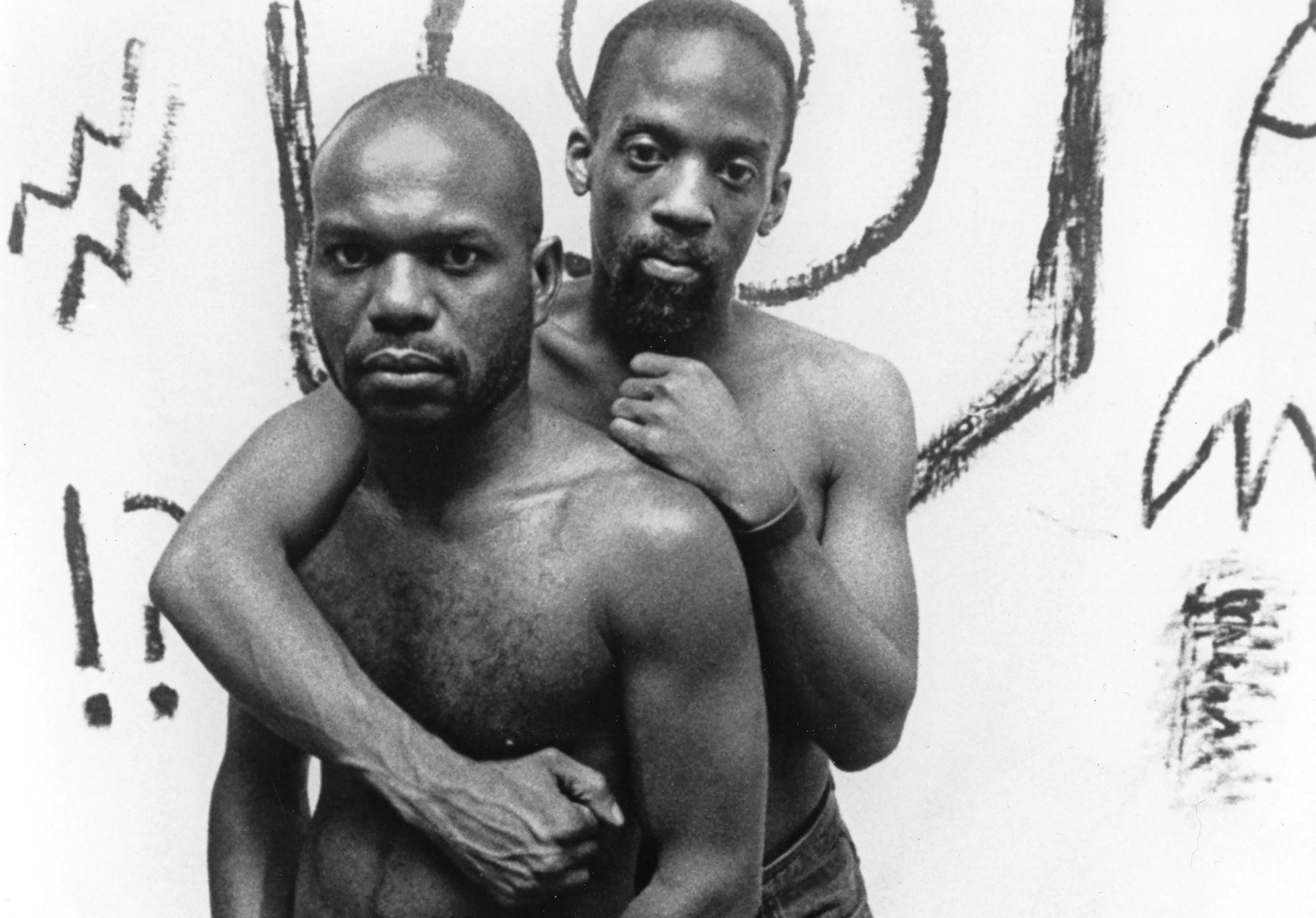 A photo of Marlon Riggs and Essex Hemphill in “Tongues Untied,” a documentary directed by Riggs in 1989.