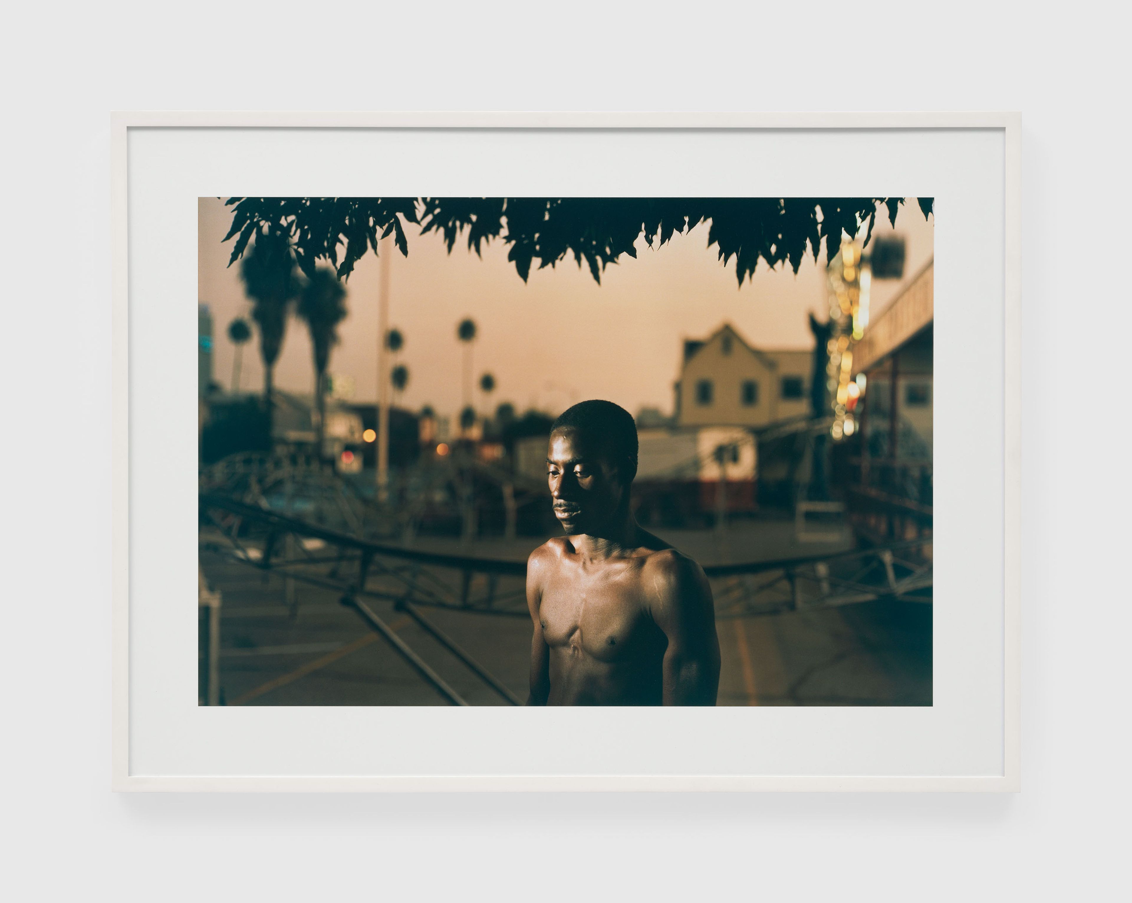 A photograph by Philip-Lorca diCorcia titled André Smith, 28 years old, Baton Rouge, Louisiana, $30, dated 1990-1992.