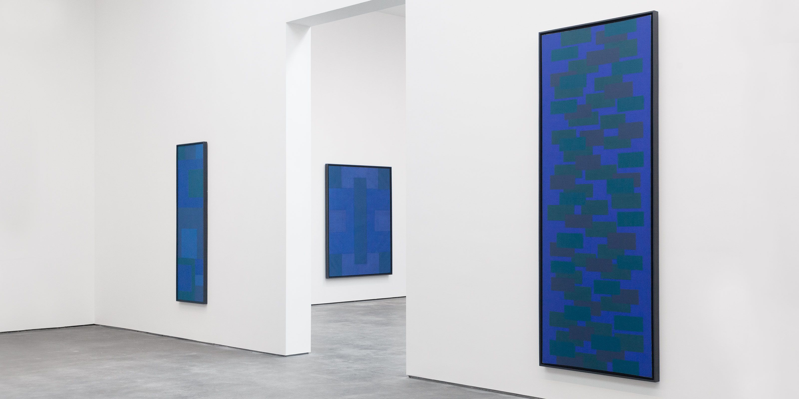 Installation view of the exhibition Ad Reinhardt: Blue Paintings, at David Zwirner in New York, dated 2017.