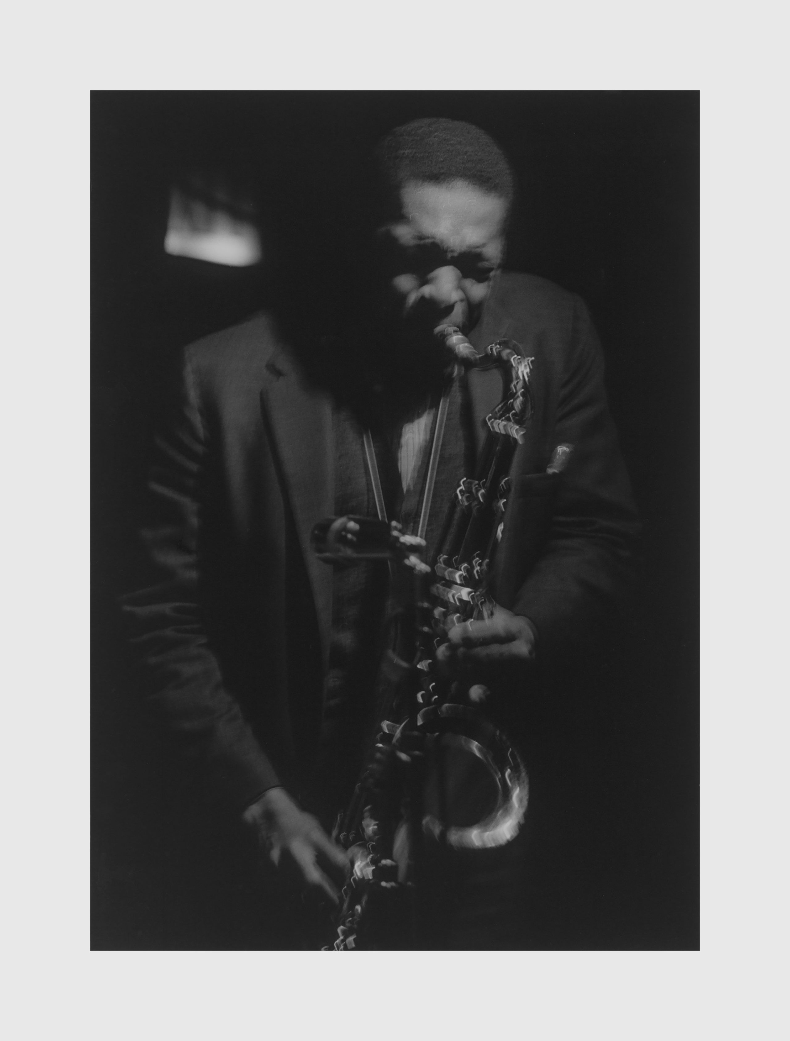 A silver gelatin print by Roy DeCarava, titled Coltrane #24, dated 1961.