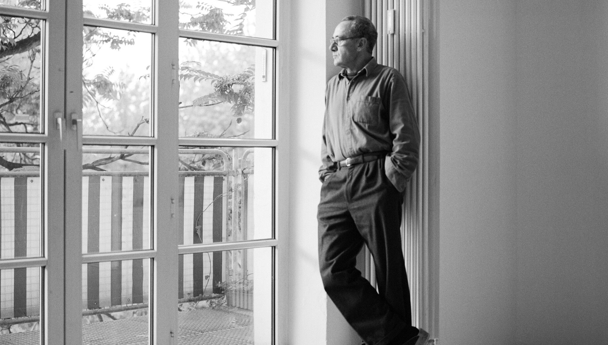 A photo of Gerhard Richter in his studio in Cologne, dated 1991.