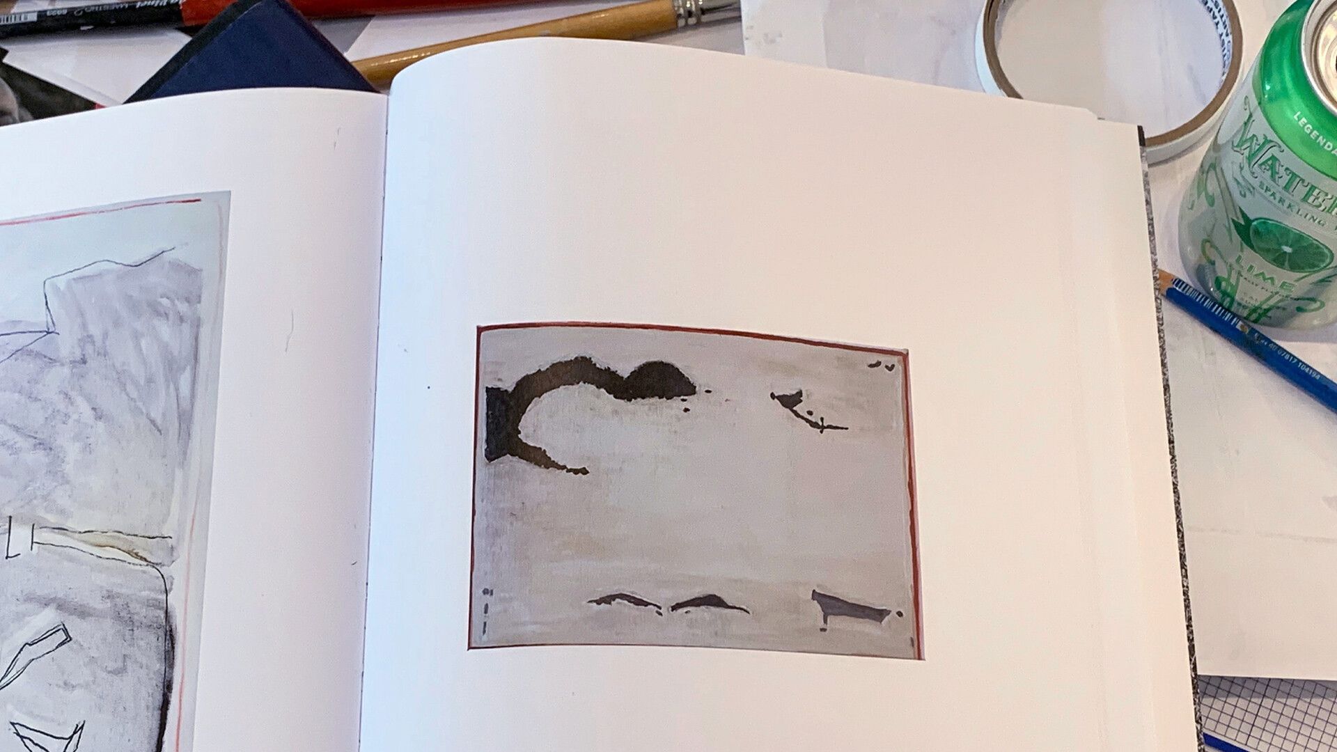 A photo of a Raoul De Keyser catalogue open to the page illustrating his painting Oskar 10 (2005) in Ridley Howard’s studio