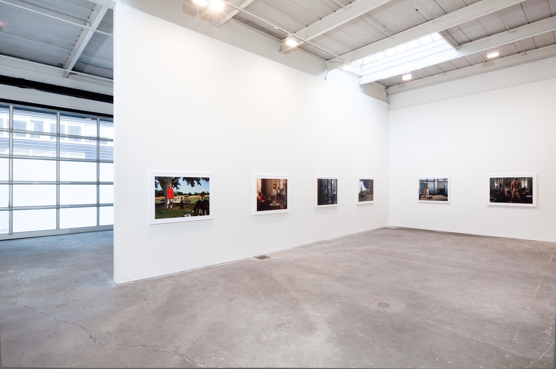 Installation view of the exhibition Philip-Lorca diCorcia: ELEVEN at David Zwirner in New York, dated 2011.