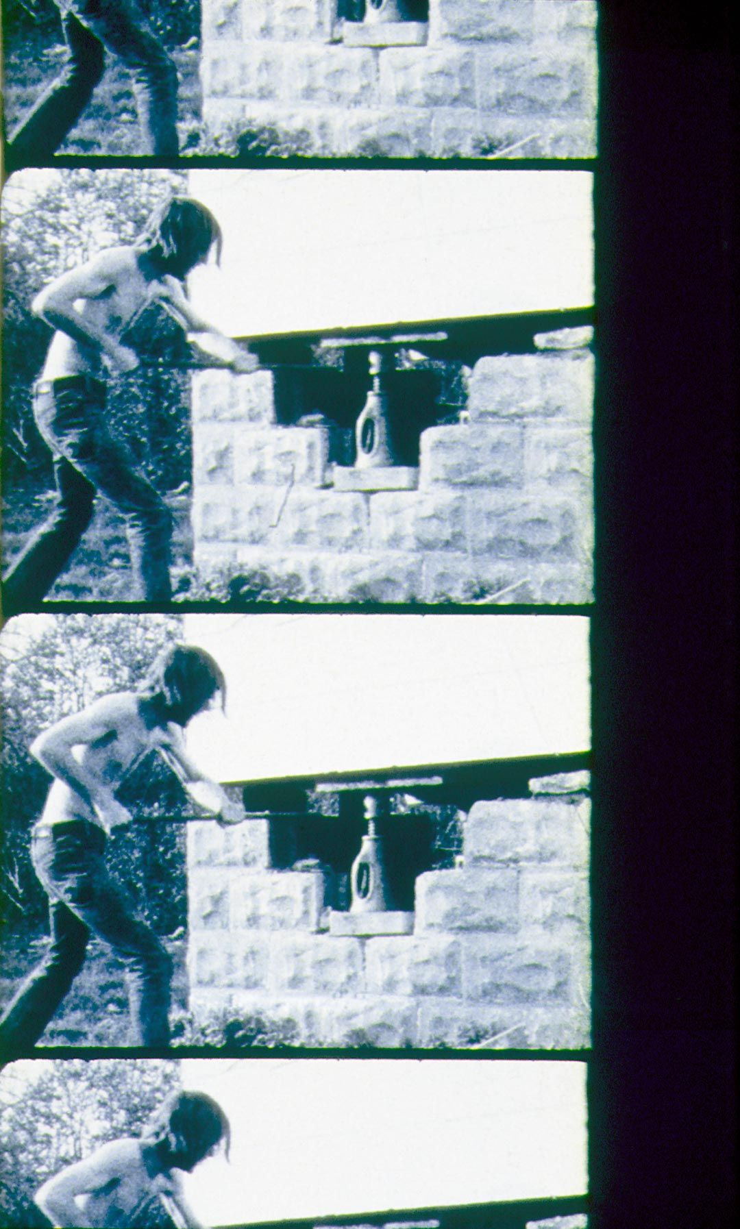 A still from a film by Gordon Matta-Clark, titled Splitting, dated 1974.