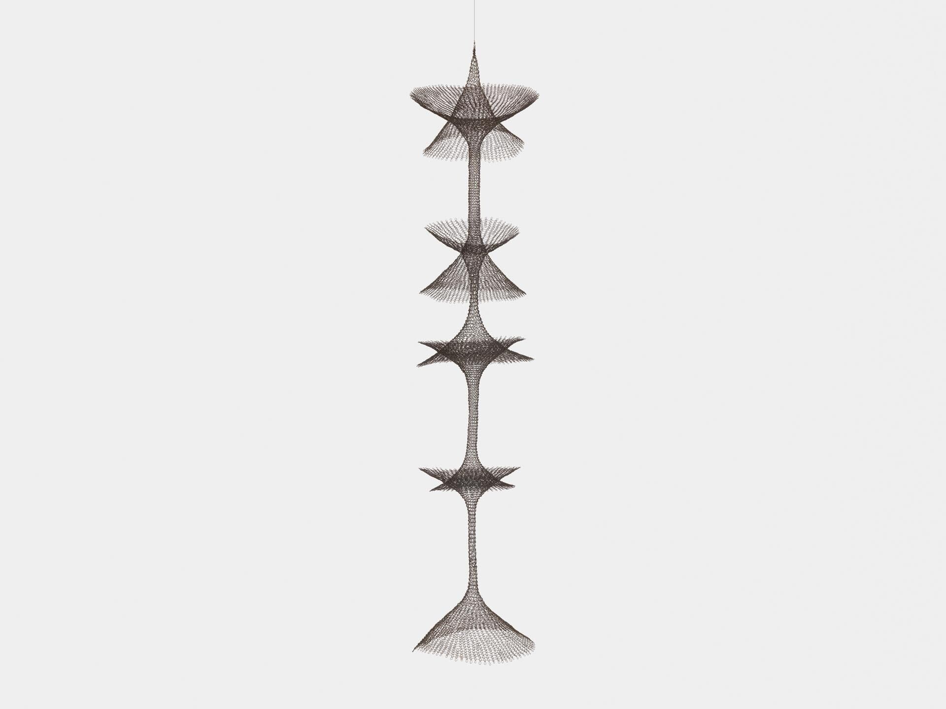 A sculpture by Ruth Asawa, titled Untitled (S.335, Hanging 4 1/2 Open Hyperbolic Shapes that Penetrate Each Other), dated circa 1954.
