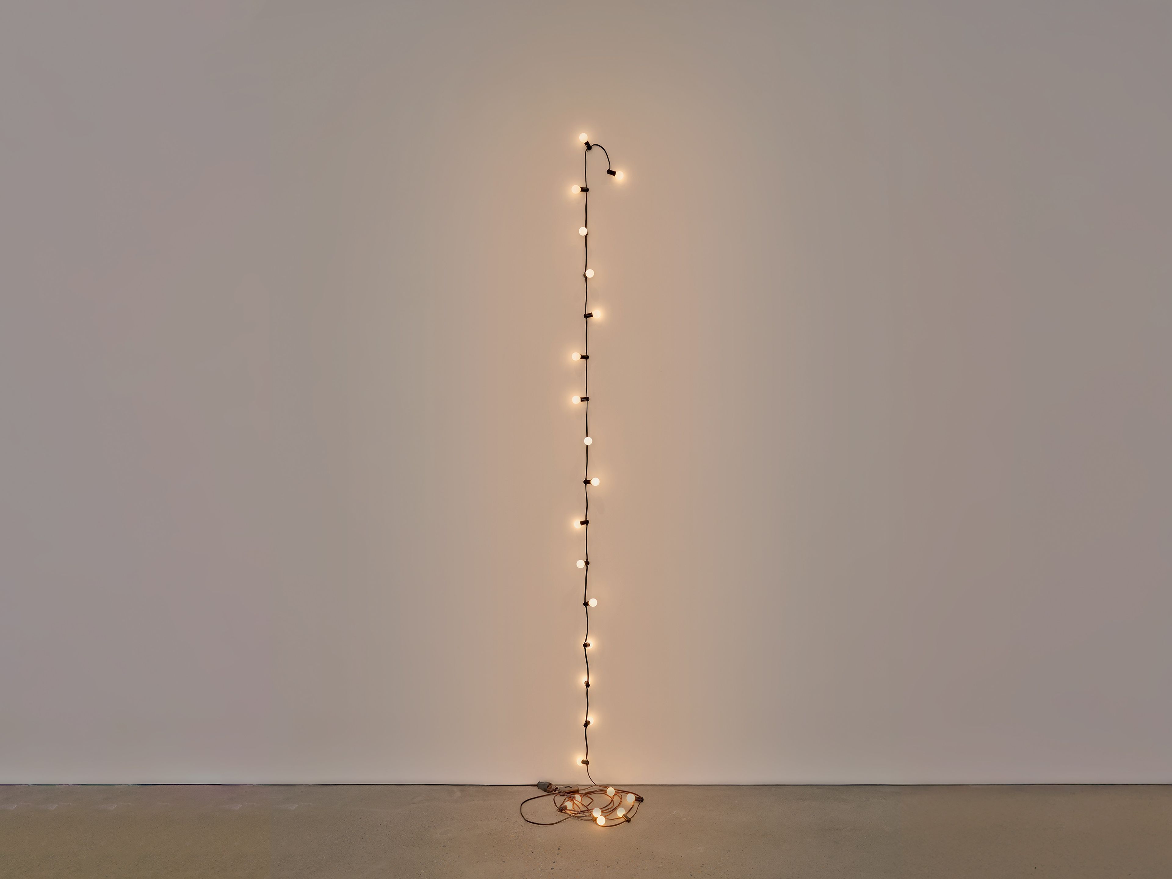 A sculpture by Felix Gonzalez-Torres, called Untitled (Last Light), dated 1993.
