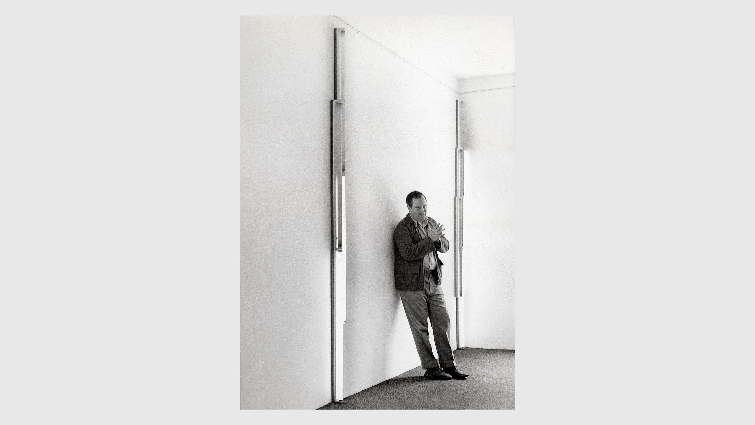 A photograph of Dan Flavin, dated 1968