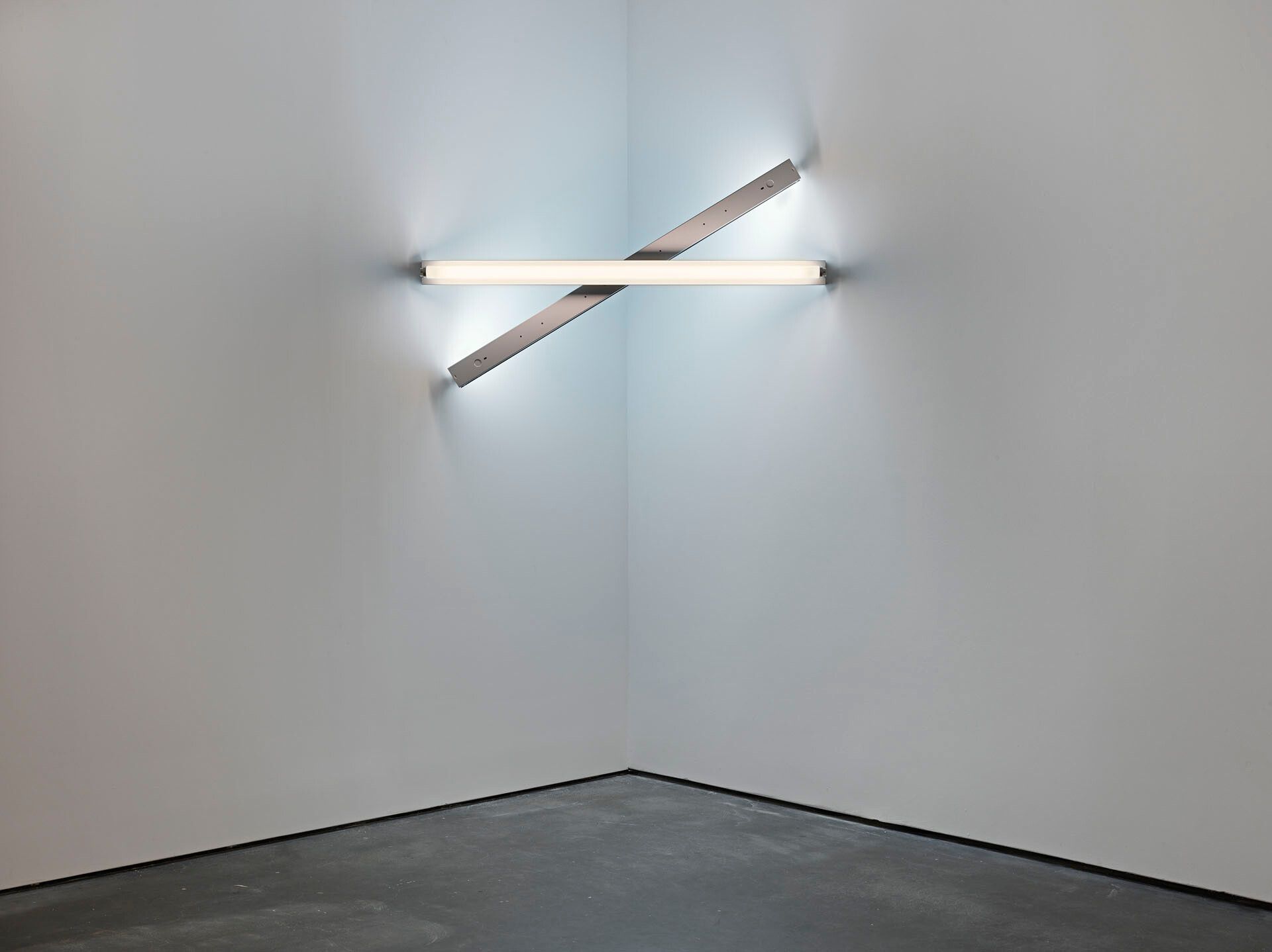 A sculpture by Dan Flavin, composed of cool white and daylight fluorescent light, titled untitled (to Cy Twombly 2), dated 1972.