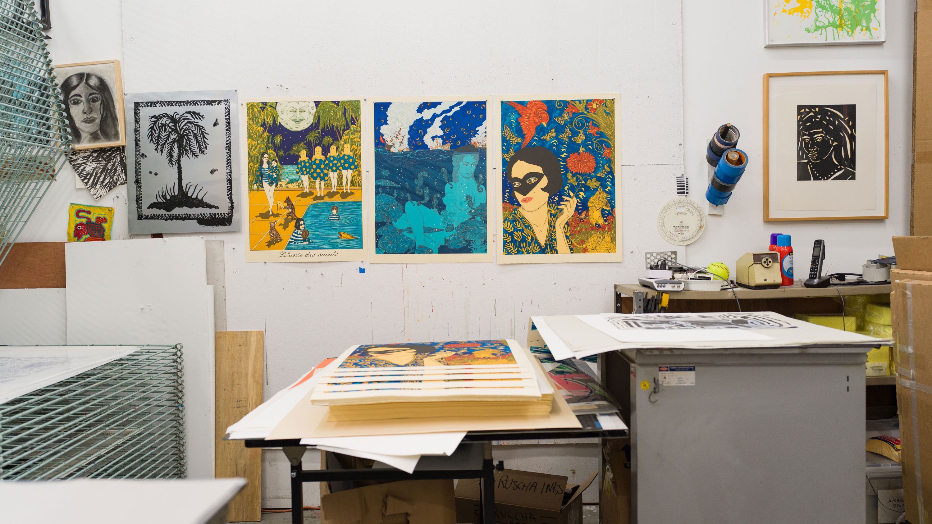A photo of Marcel Dzama prints at Derriere L’Etoile Studios, Paris, in 2021.