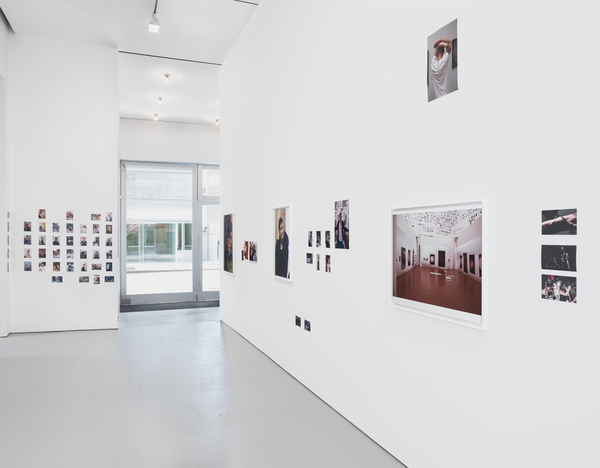 An installation of 57 photographs by Wolfgang Tillmans, titled New York installation PCR, 533 SE, dated 2015.