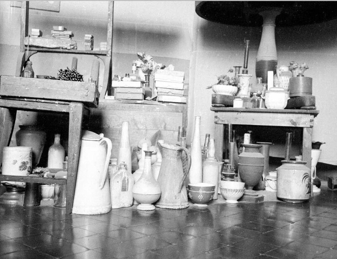 A photo by Sanford Roth of Giorgio Morandi's studio, dated c. 1946-1962.