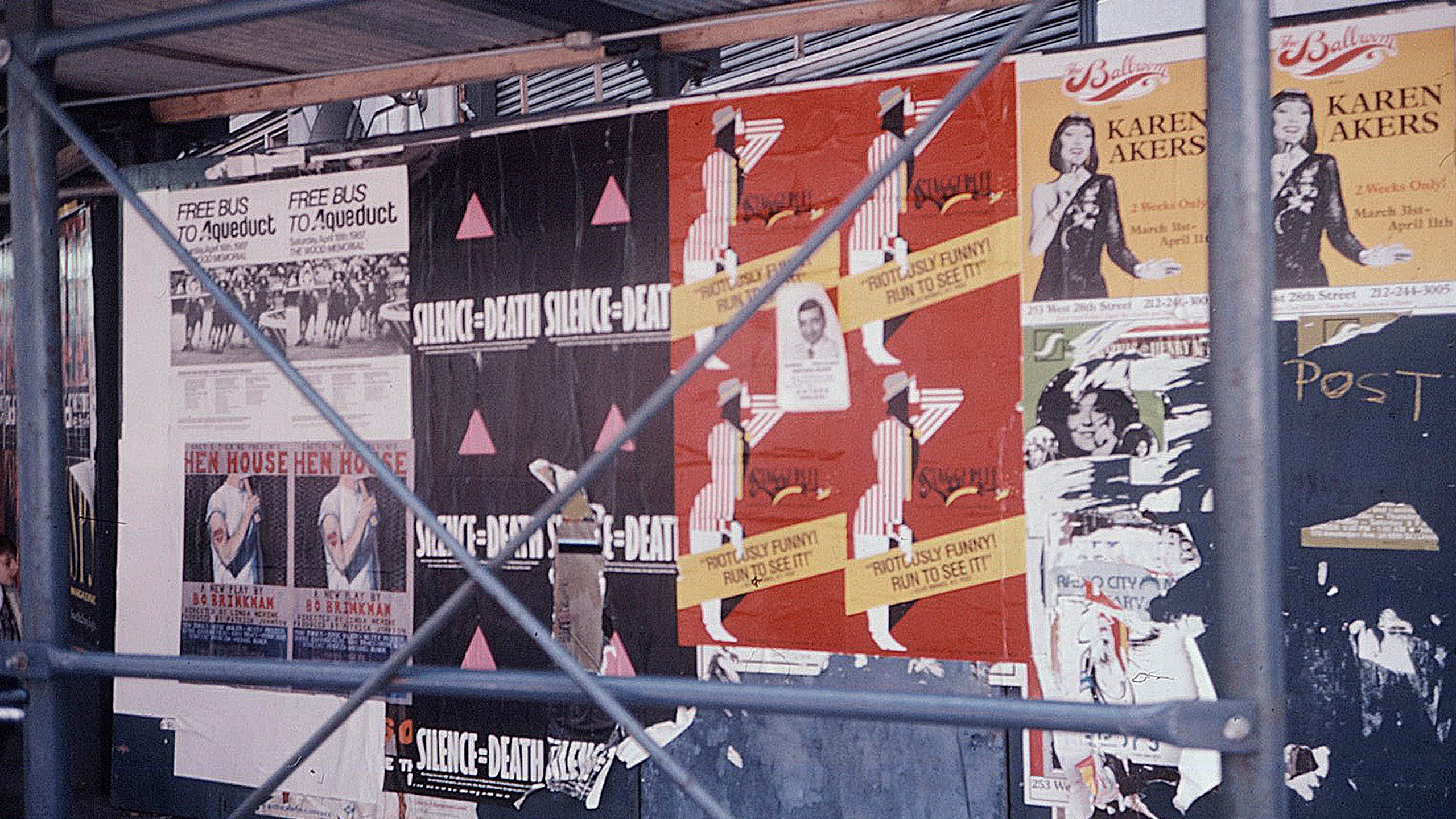 A photo of Silence=Death posters wheatpasted in New York City in 1987 before the ACT UP demonstration. Photo by Oliver Johnston.