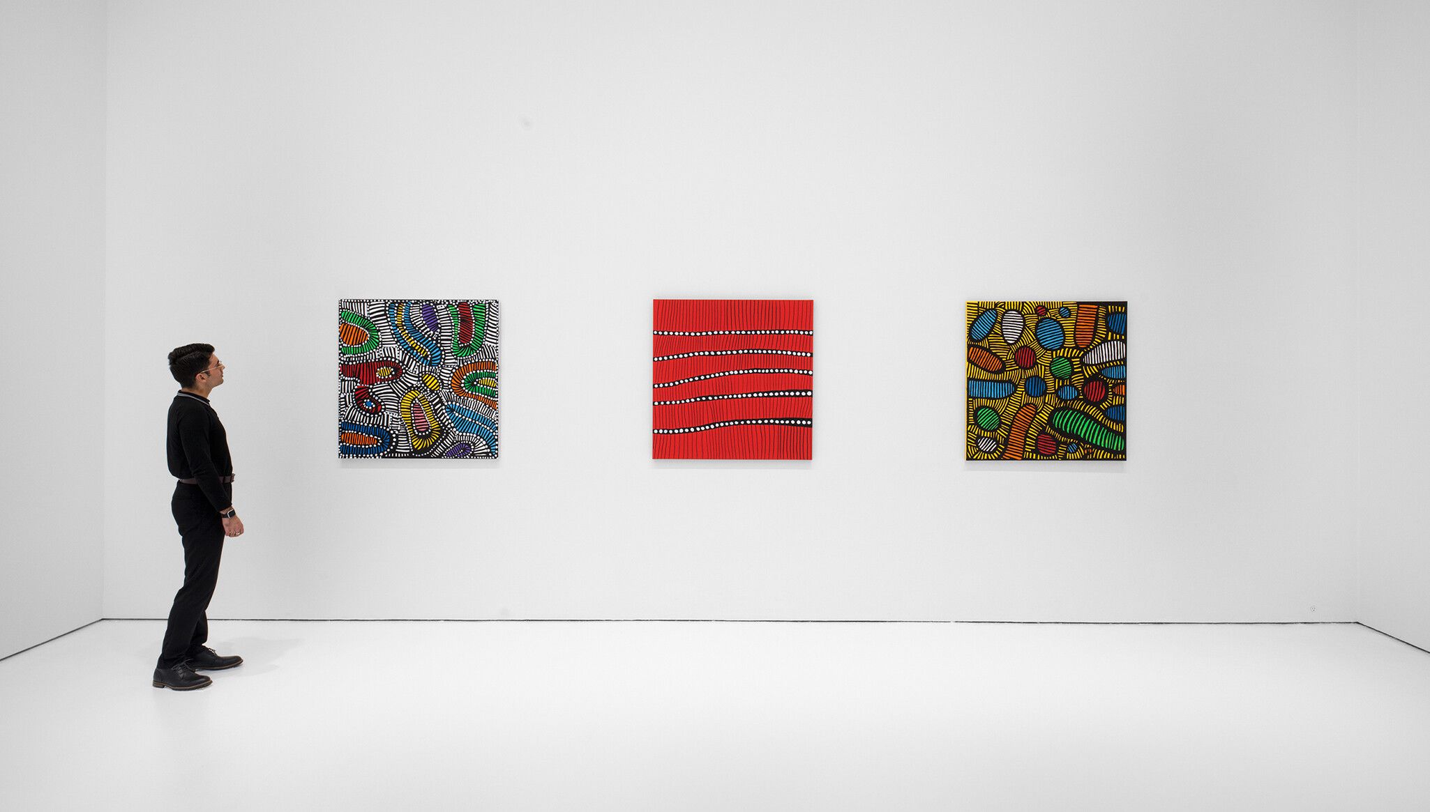An installation view of the exhibition titled Yayoi Kusama, I Spend Each Day Embracing Flowers, dated 2023