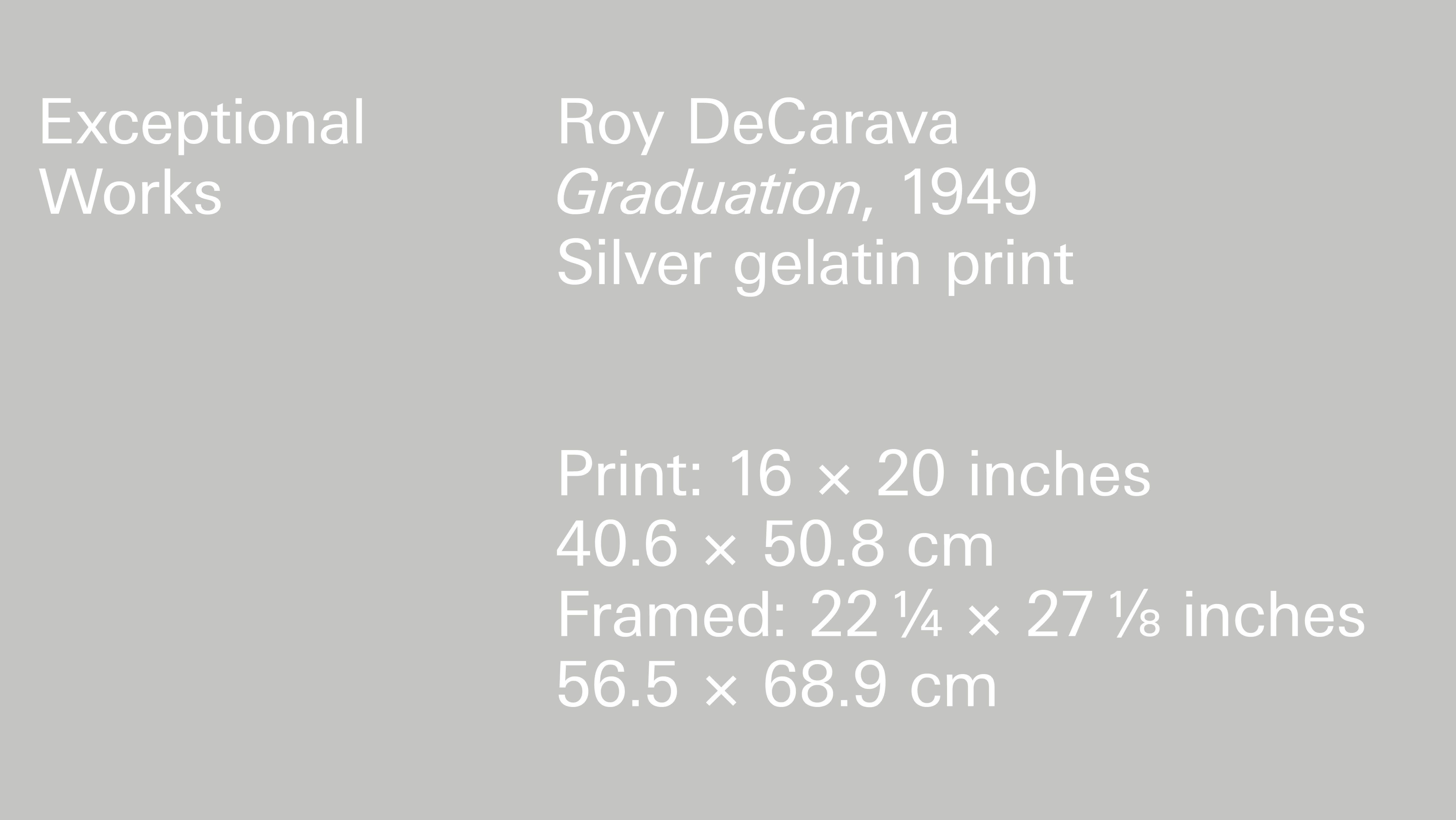 A gray title graphic containing the following information: Roy DeCarava Graduation, 1949 Silver gelatin print Print: 16 x 20 inches (40.6 x 50.8 cm) Framed: 22 1/4 x 27 1/8 inches (56.5 x 68.9 cm).