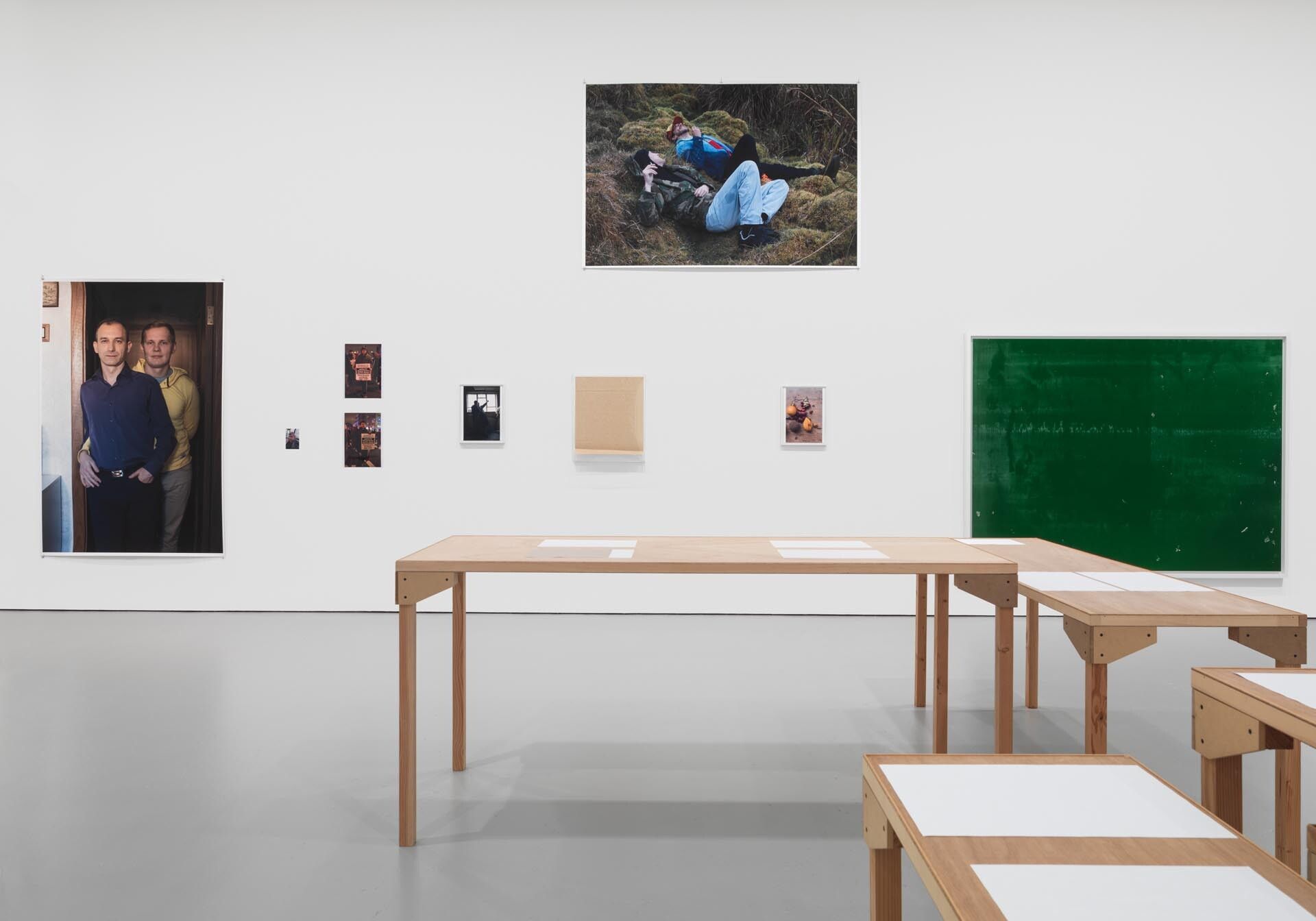 An installation of 32 photographs by Wolfgang Tillmans, titled New York Installation PCR, 525, dated 2015.