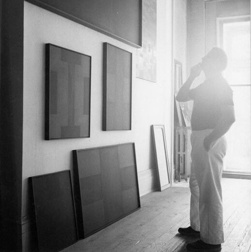 A photo of Ad Reinhardt in his studio in 1966. Photo by John Loengard.