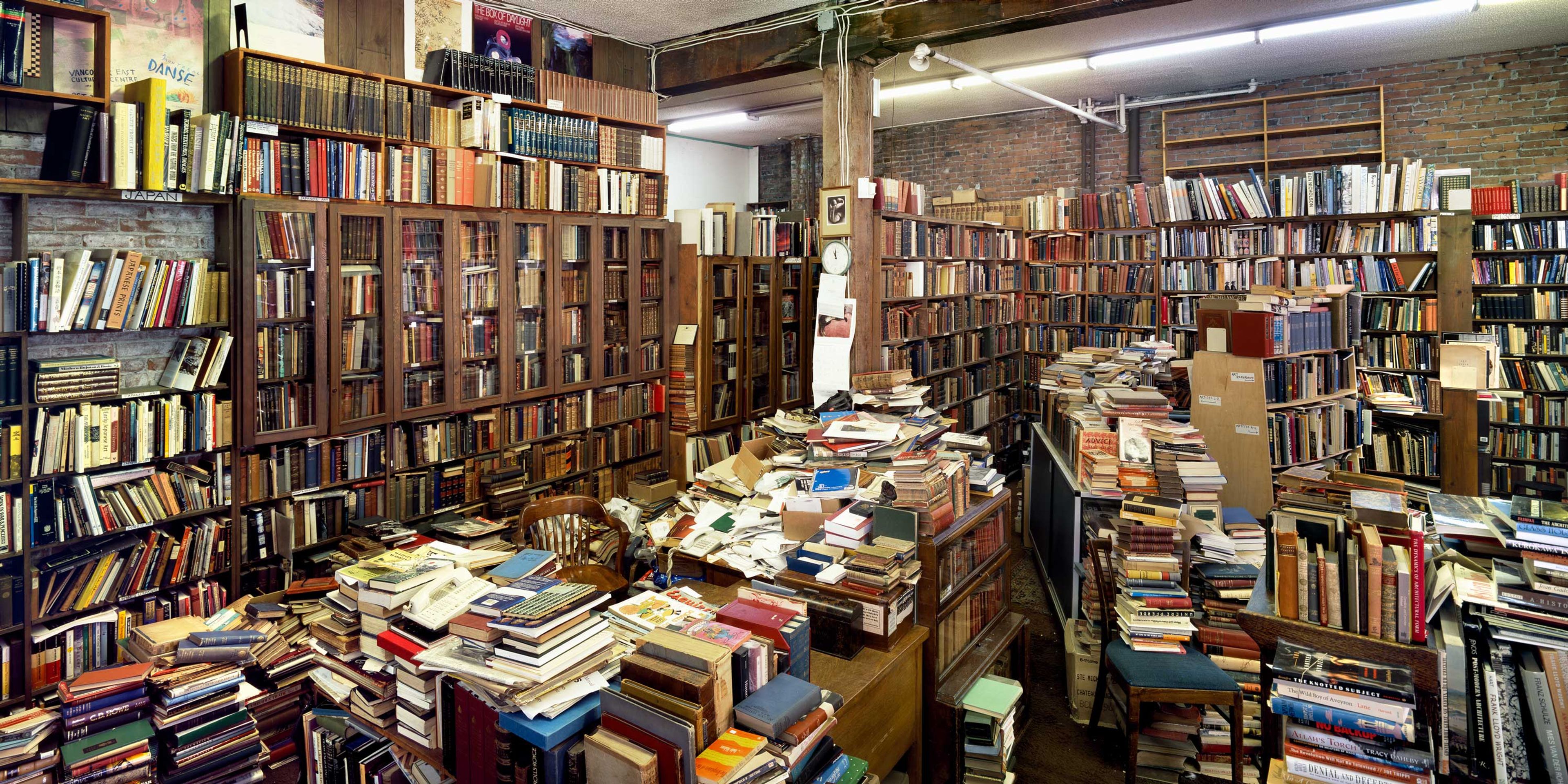 A photograph by Stan Douglas, titled MacLeod’s Books, Vancouver, dated 2006.