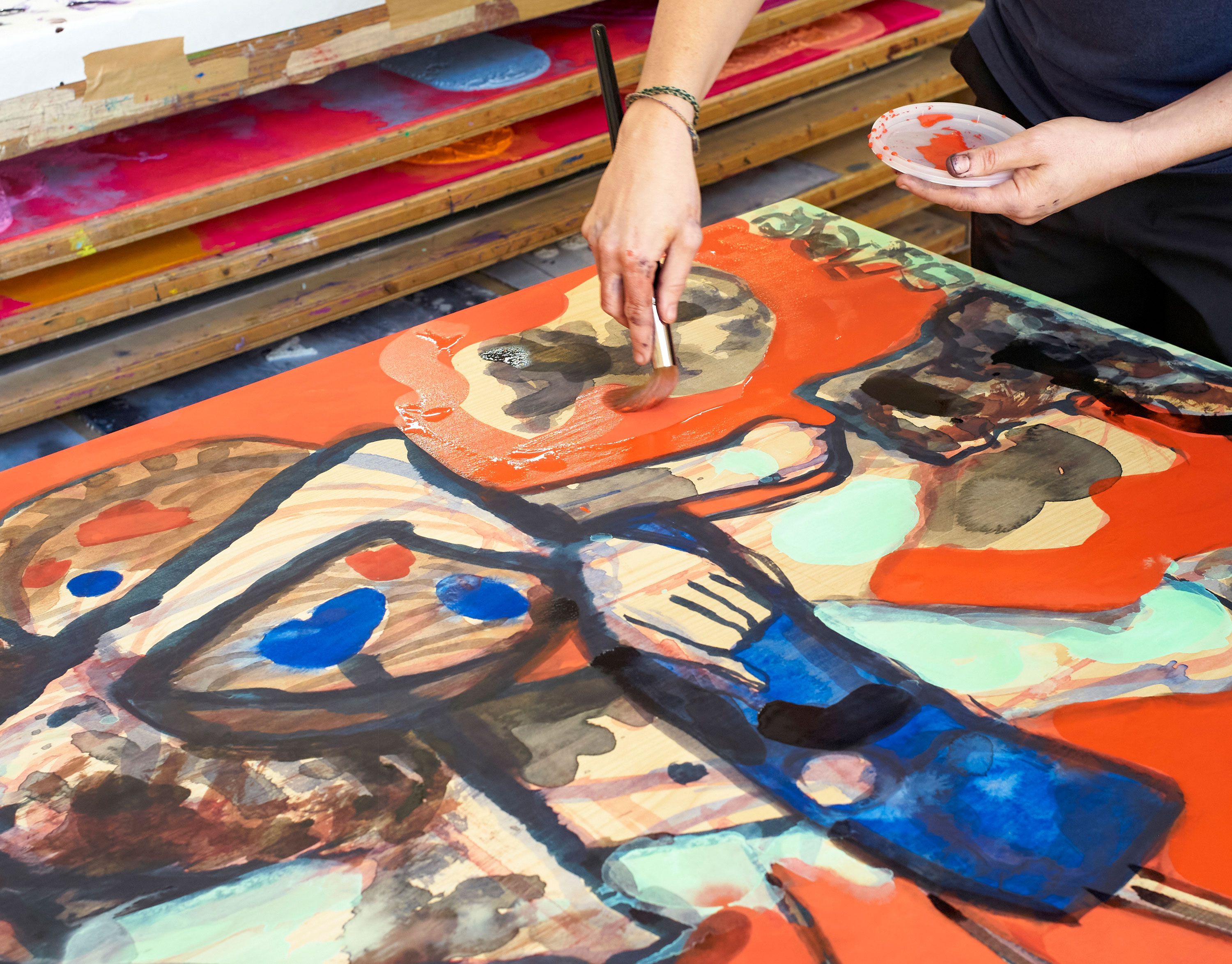 A closeup of Dana Schutz in the studio at Two Palms, where she created prints since 2012. Photo by Max Farago