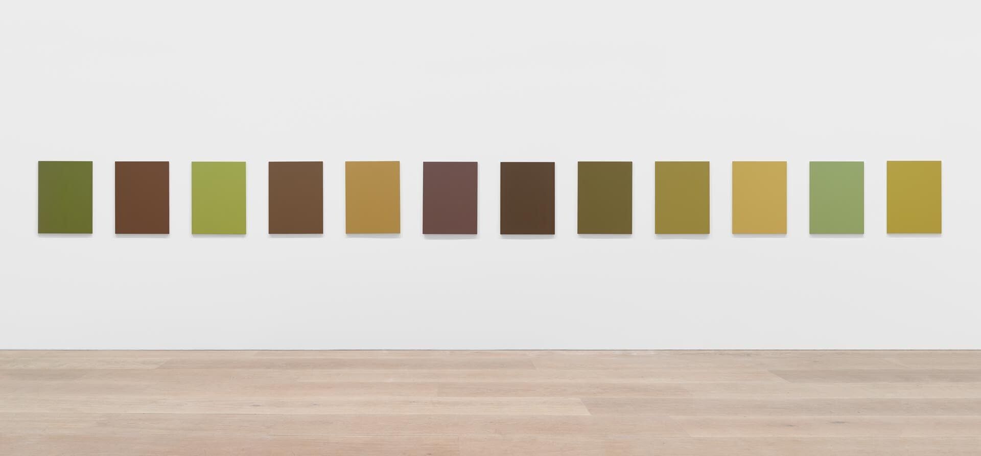 An installation view of the Sherrie Levine painting series, titled Monochromes after Van Gogh Sunflowers: 1-12, dated 2015.