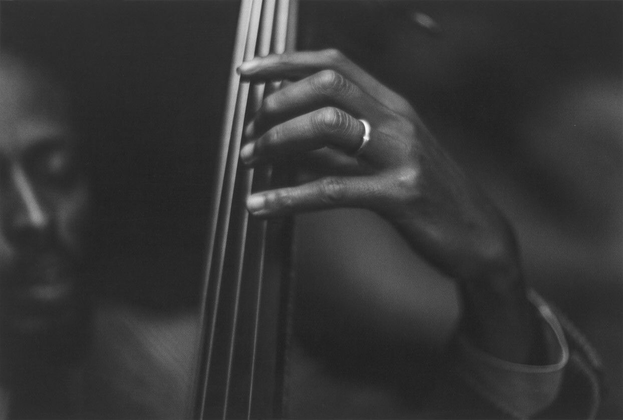A silver gelatin print by Roy DeCarava, titled Percy Heath, dated 1957.
