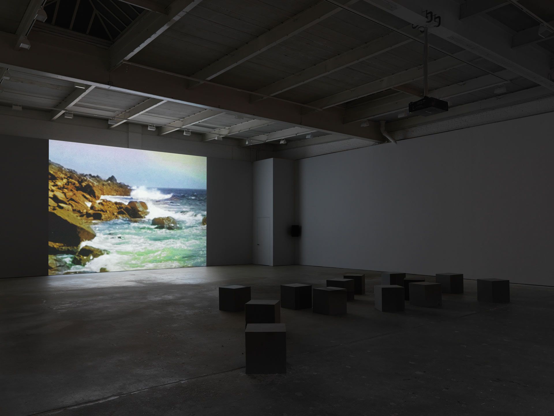 An installation view featuring a film by James Welling, dated 2017