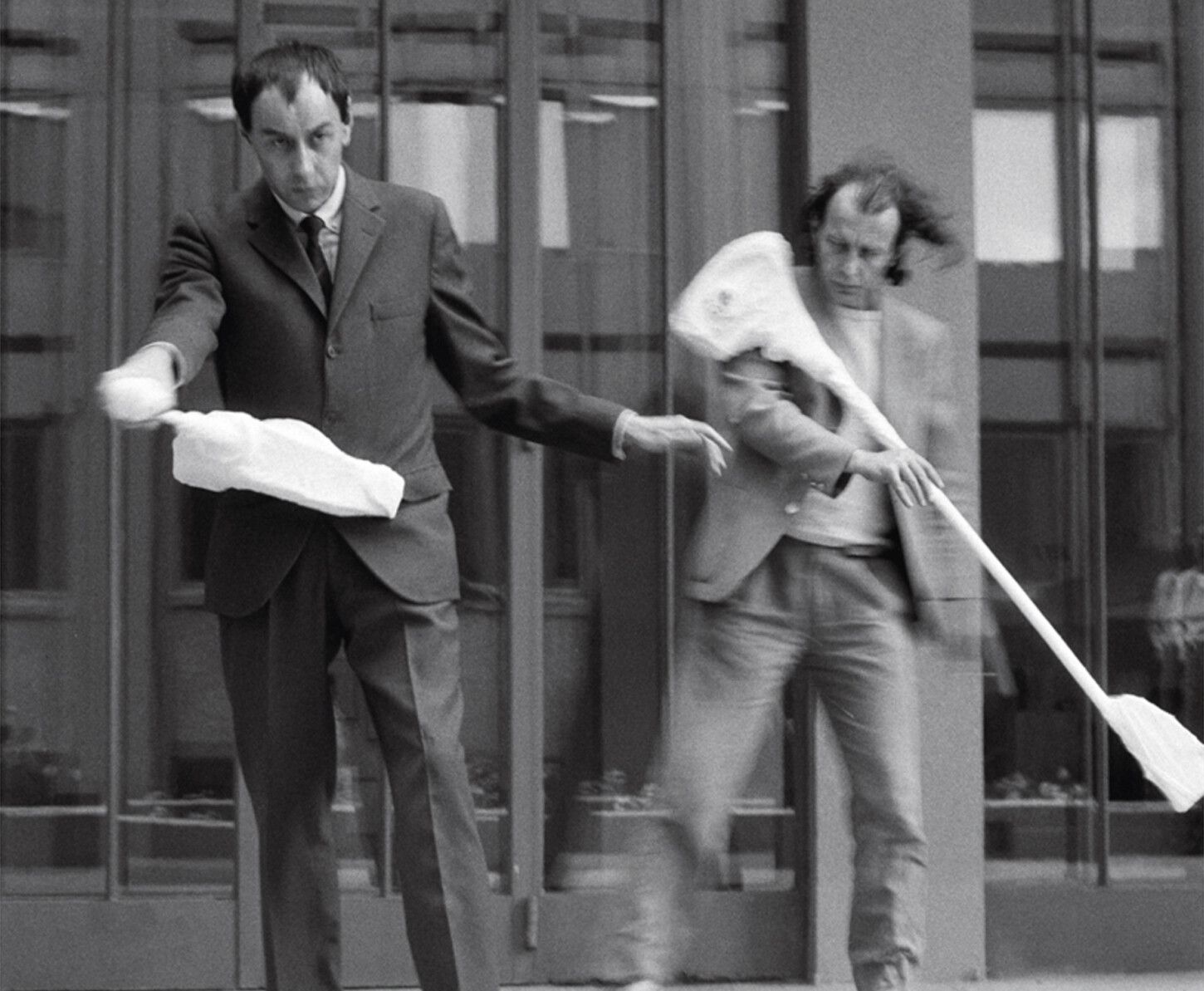 Franz West and Janc Szeni performing West’s Passstücke in front of Haus Wittgenstein, Vienna, ca. 1978.