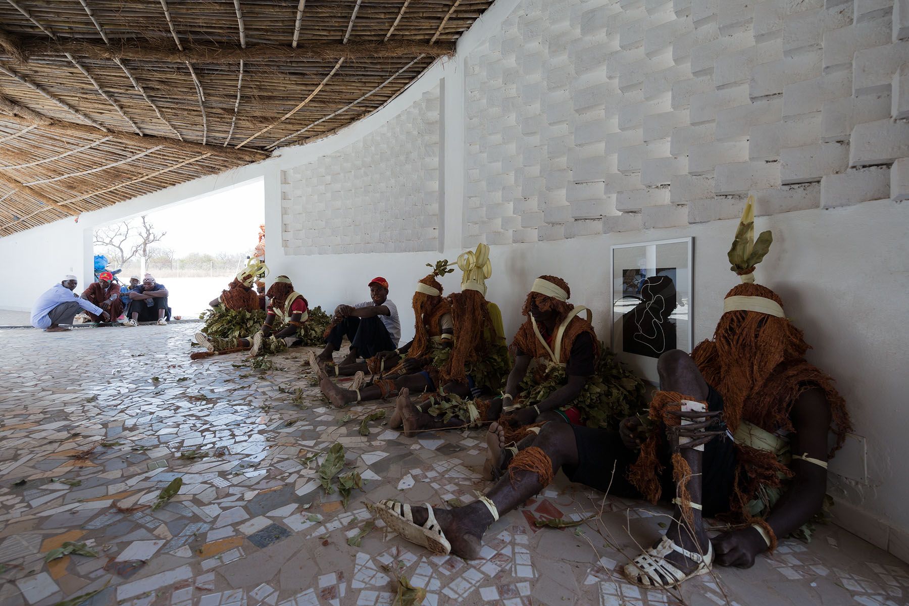 A photograph by Iwan Baan, titled Bassar Dancers Rest, undated.