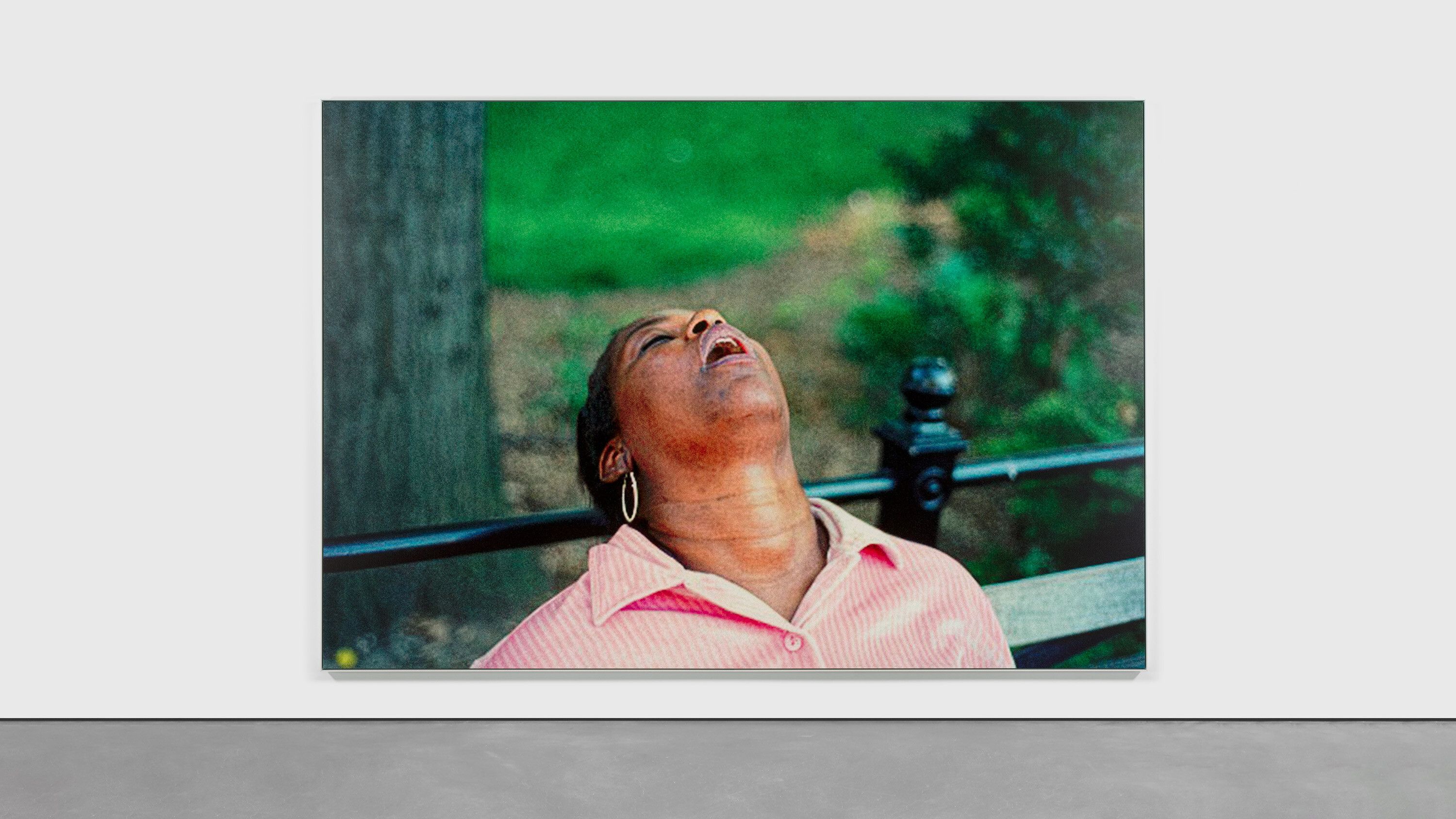 An installation view of an artwork by Steven Shearer, titled Woman on Bench, titled 2024