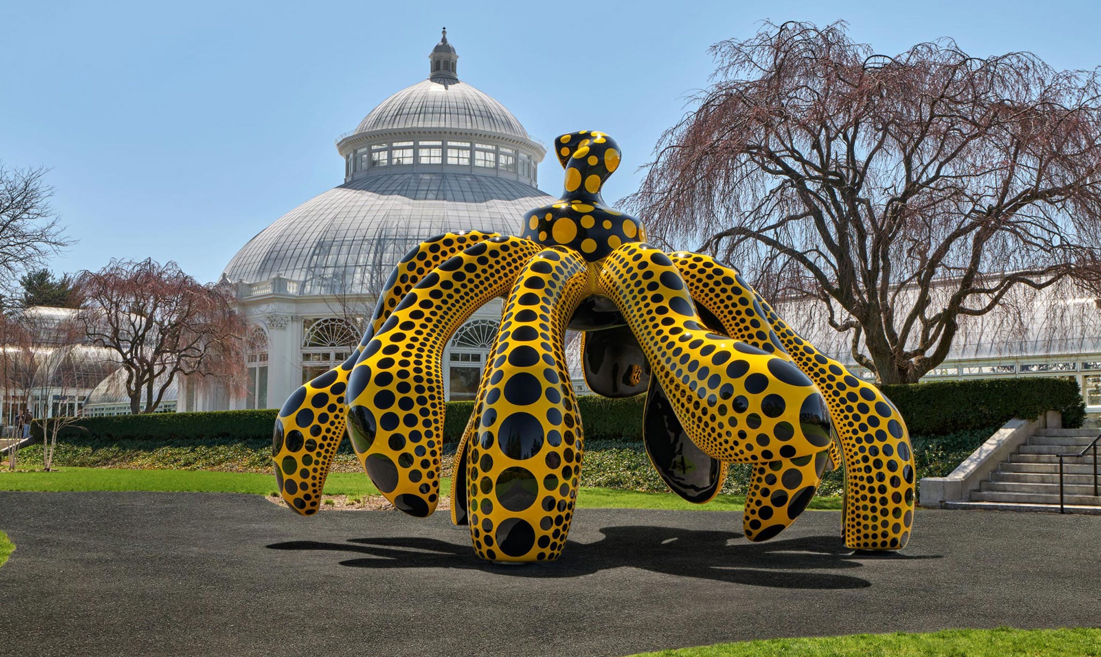 A sculpture by Yayoi kusama, titled Dancing Pumpkin, dated 202.