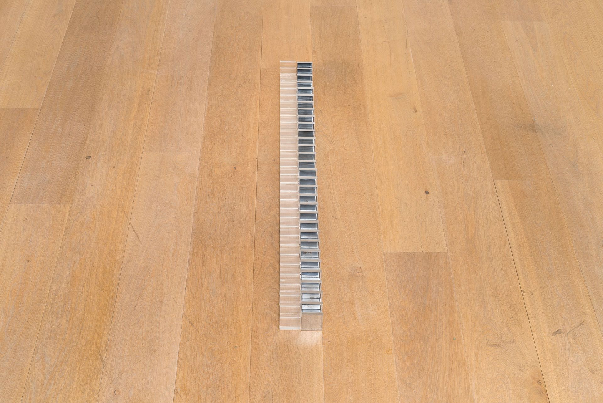 A chrome sculpture by Guy Mees titled 31X (60x60x6) plexiglas, 31X (60x60x6) chroom (31X [60x60x6] plexiglas, 31X [60x60x6] chrome), dated 1968-1970
