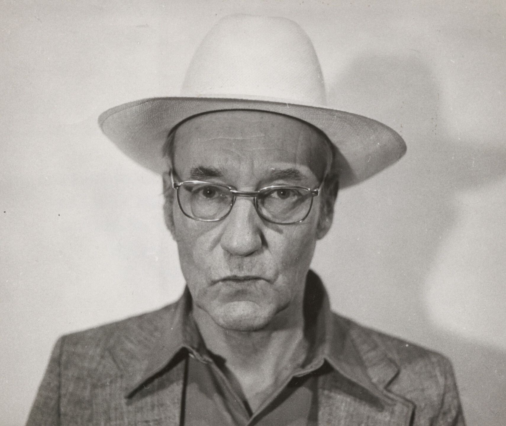 An undated vintage black and white gelatin print by Jimmy DeSana, titled William Burroughs.