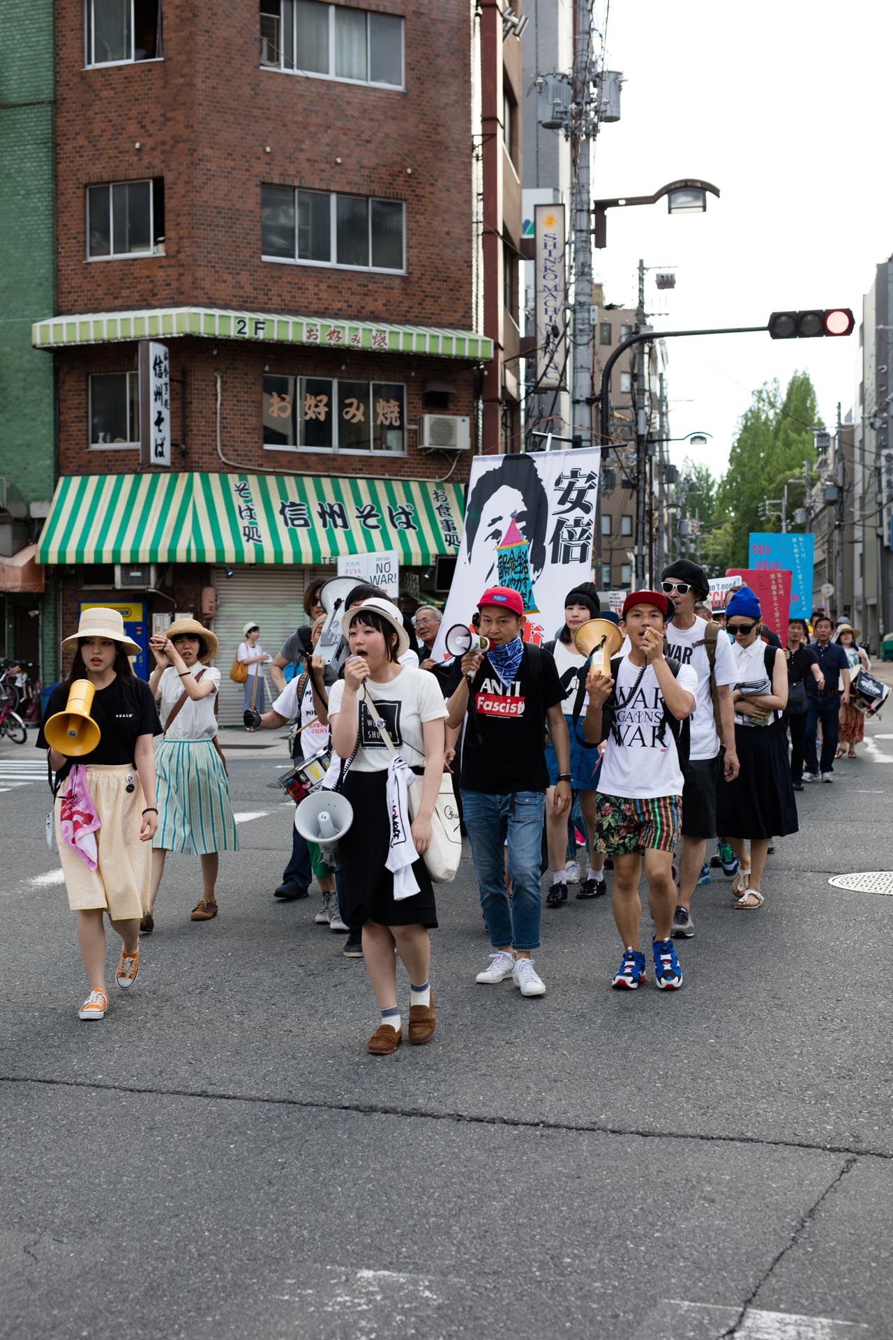 A photograph by Wolfgang Tillmans, titled Anti-remilitarisation Demo, Osaka, b, dated 2015.