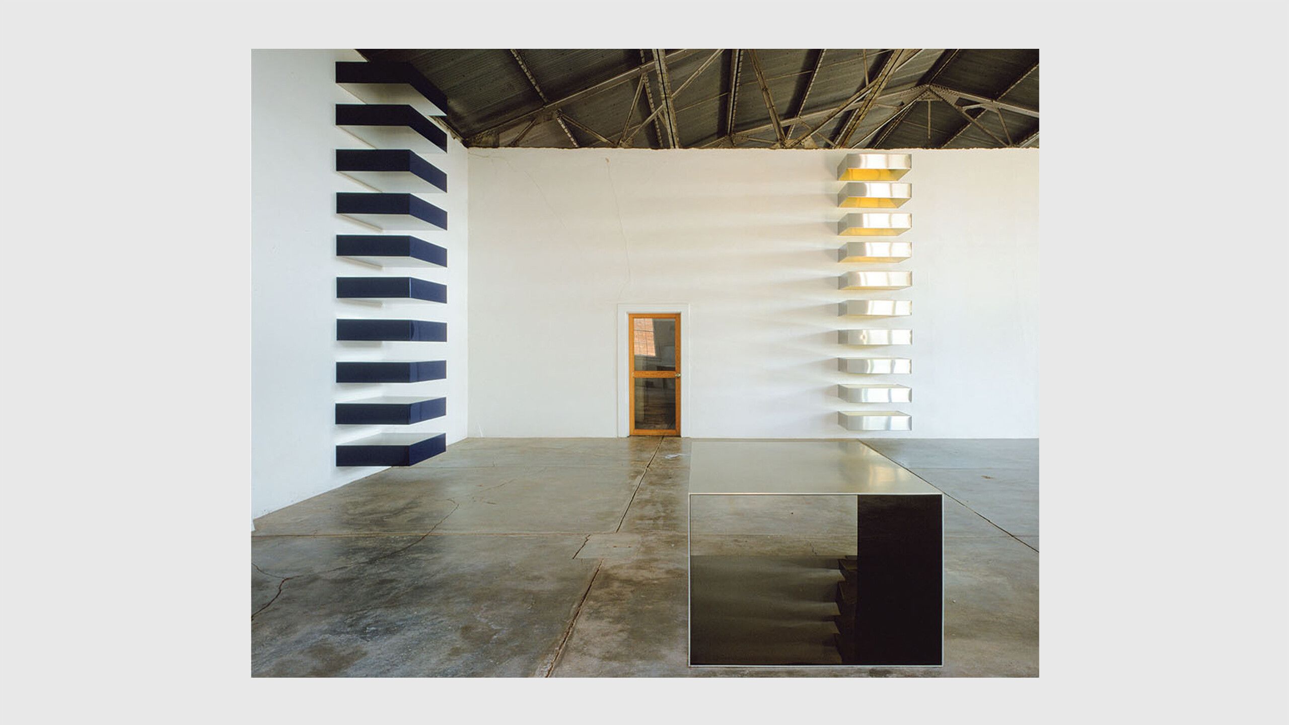 An installation view of works by Donald Judd installed at The Block, at Judd Foundation in Marfa, Texas.