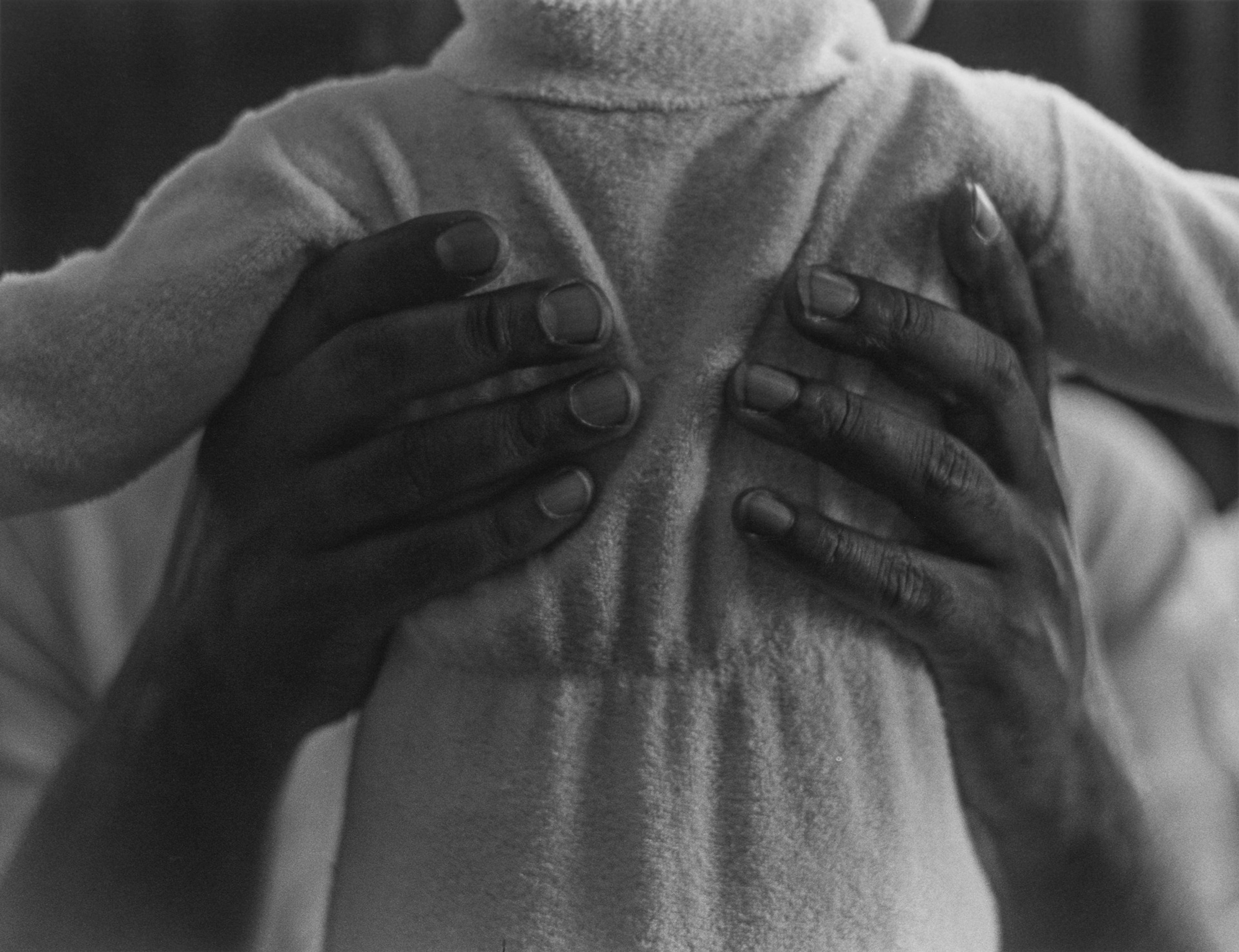A photograph by Roy DeCarava, titled Bill and son, dated 1962.