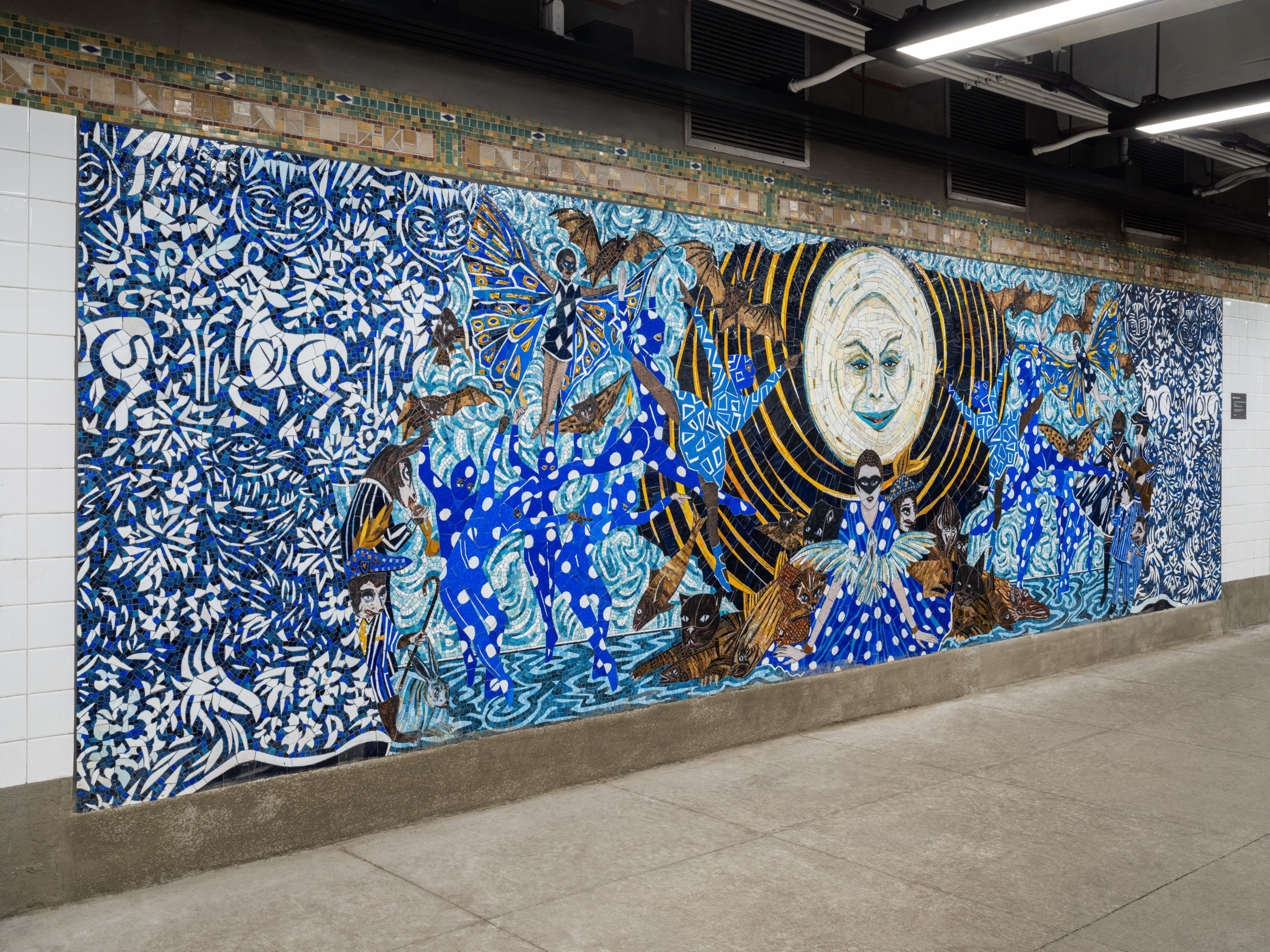A left-angled installation view of a mosaic commissioned by the MTA called No Less Than Everything Comes Together, Marcel Dzama, 2021.