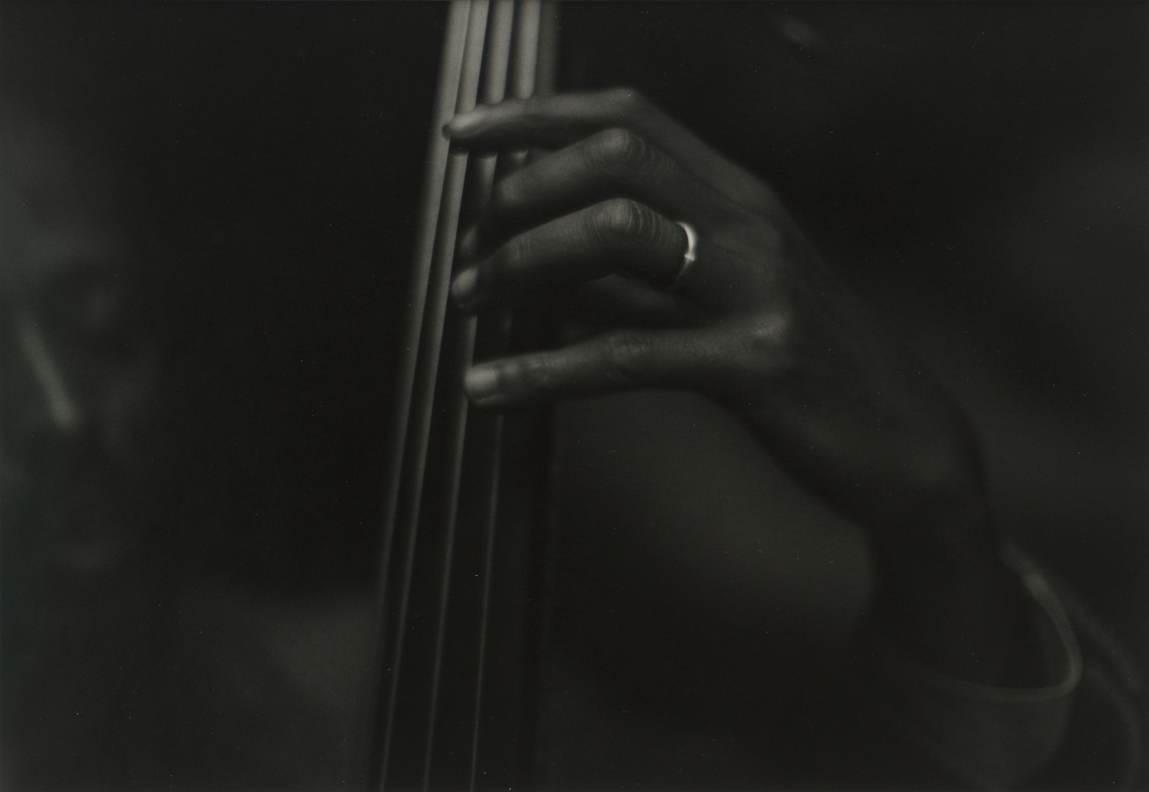 A silver gelatin print by Roy DeCarava, titled Percy Heath, dated 1957.