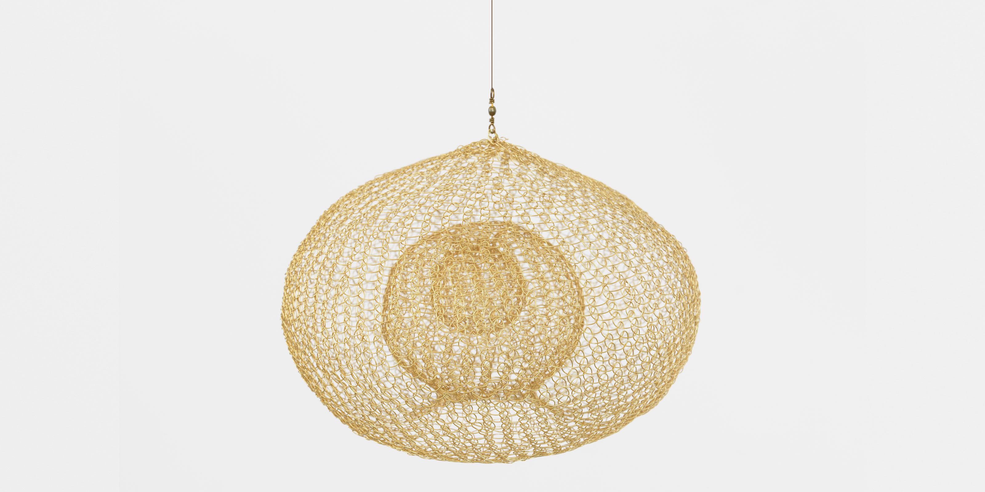 A sculpture by Ruth Asawa, titled Continuous (S.340, Hanging, Miniature Single-Lobed, Three Layered Continuous Form within a Form), dated 1981 to 1982.