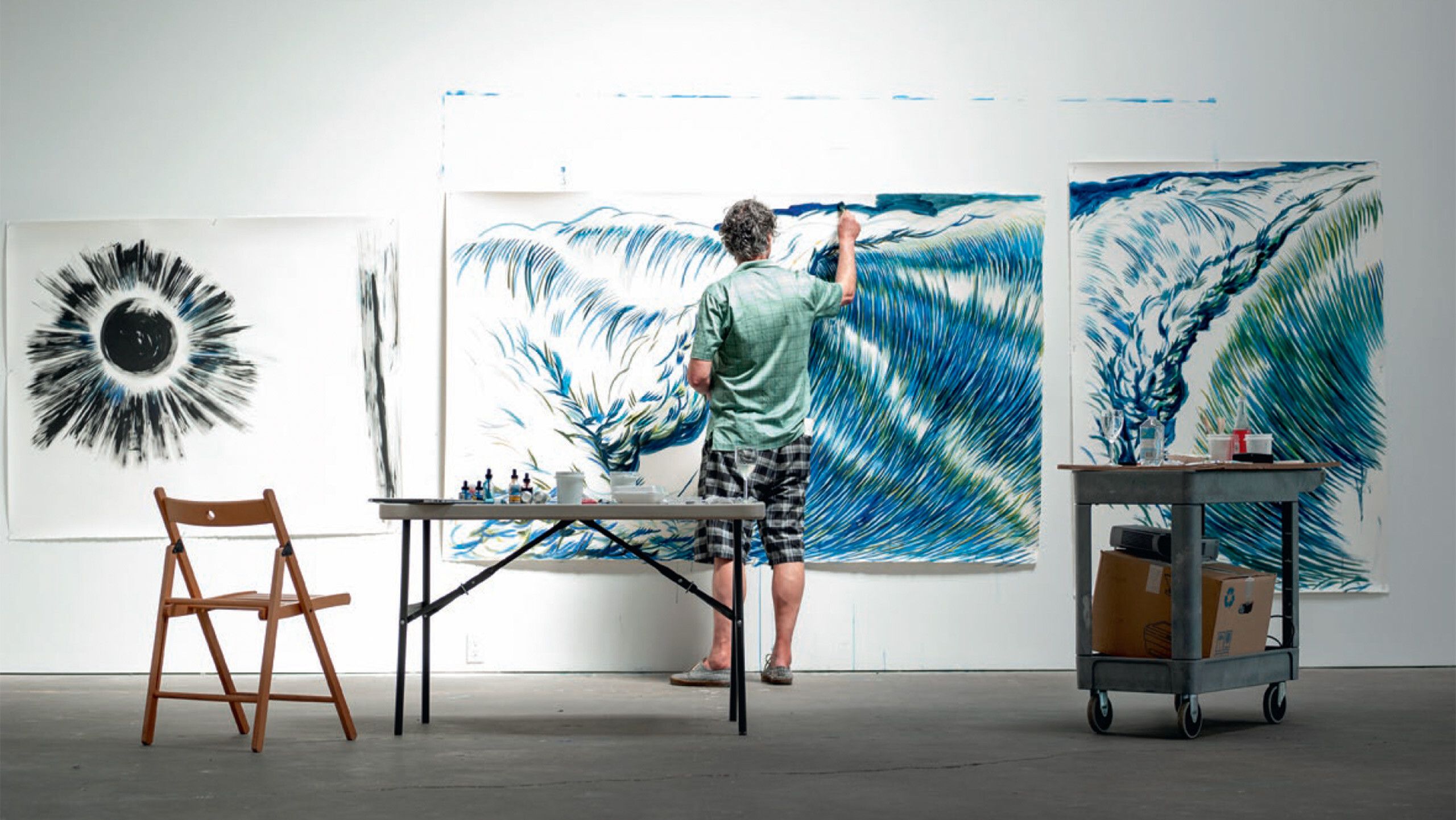 Raymond Pettibon painting at David Zwirner, New York, 2011. Photo by Aubrey Mayer