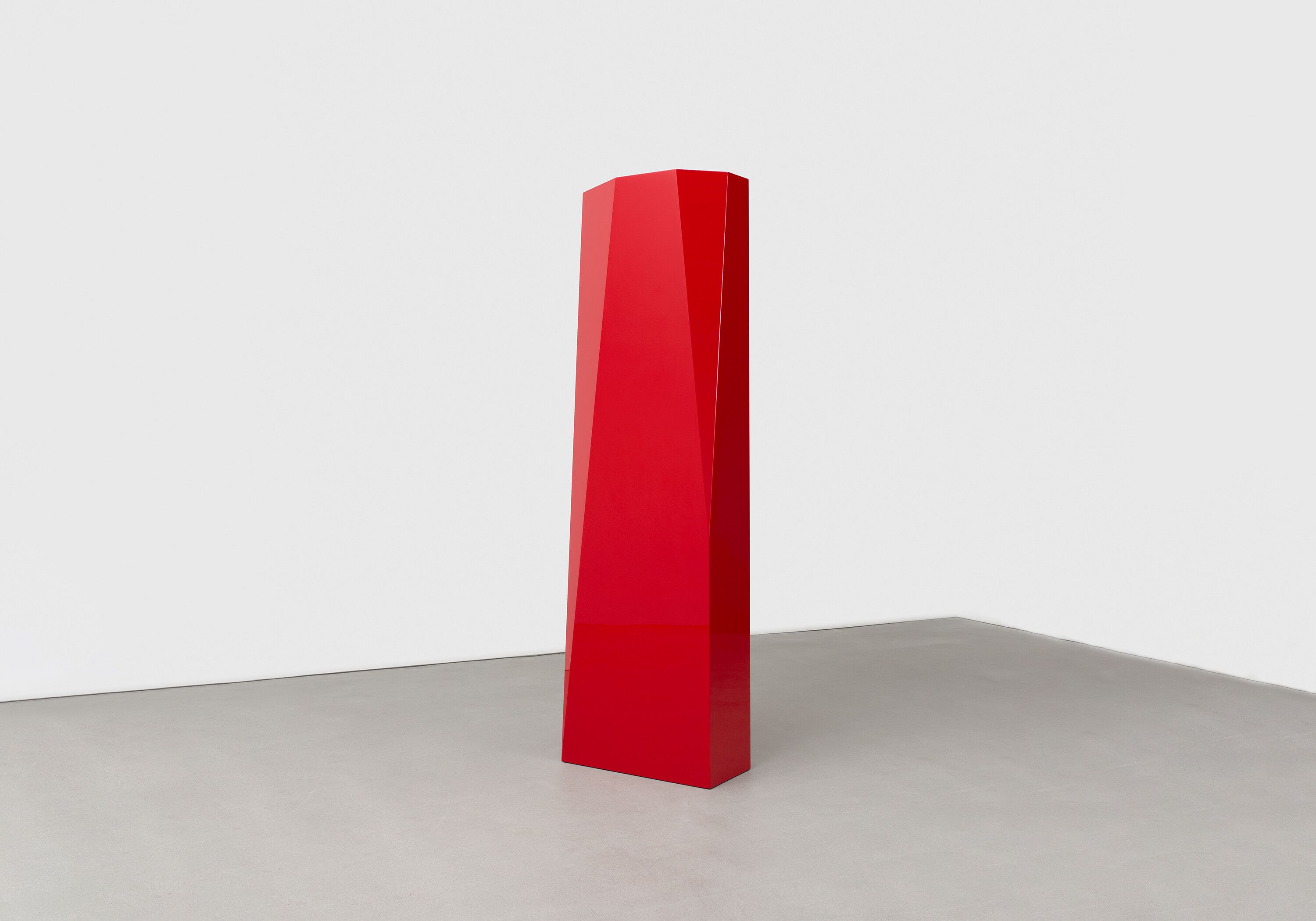 A mixed media sculpture by John McCracken, titled Chieftain, dated 1992.
