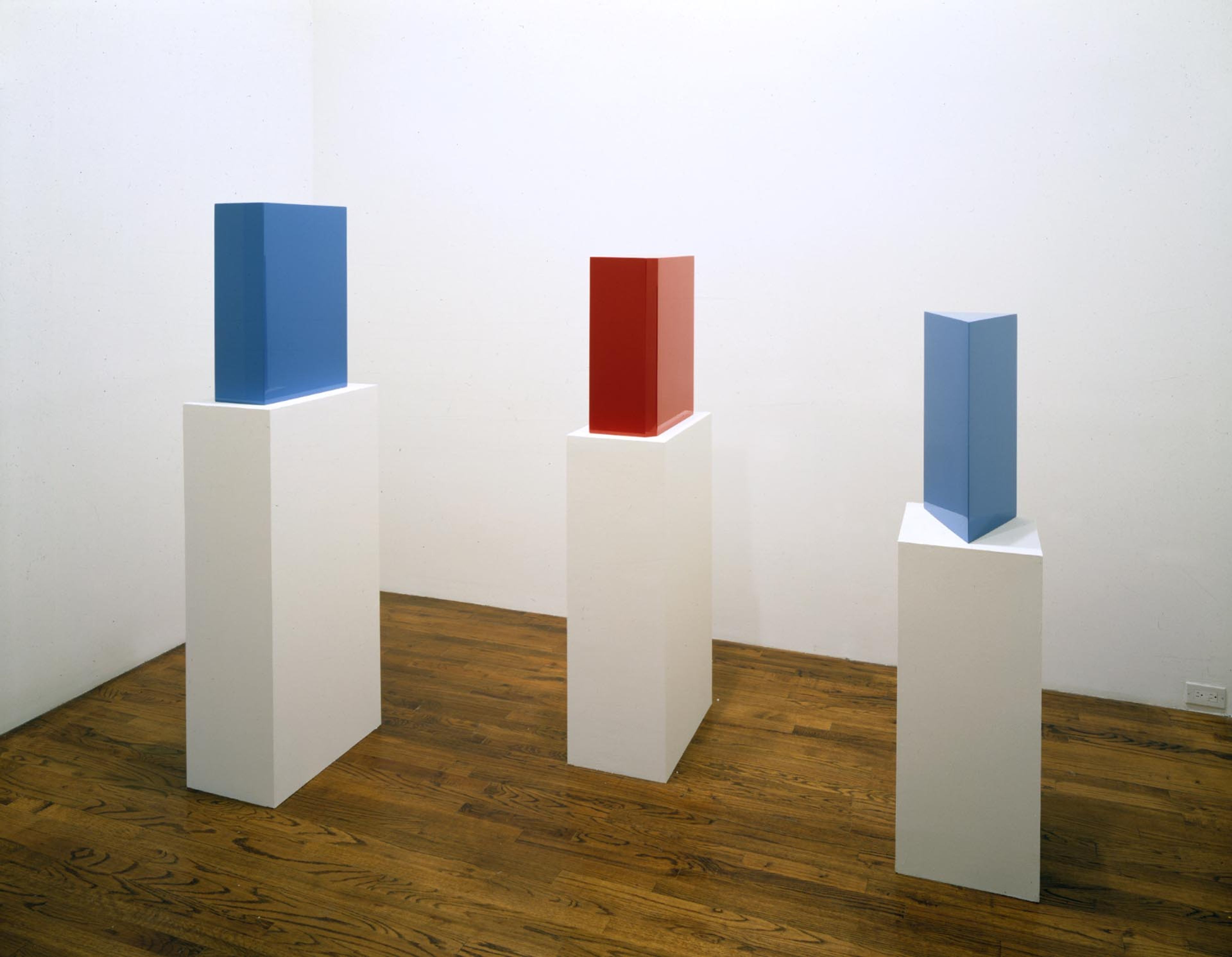 An installation view of the exhibition John McCracken: Sculpture, at David Zwirner New York, dated 1997.