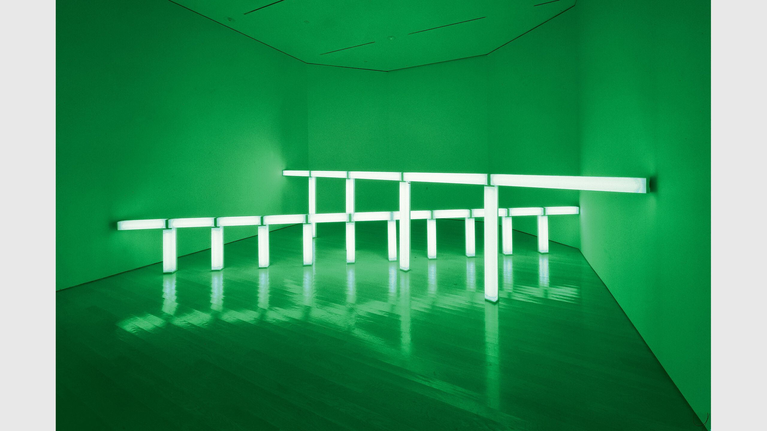 A work by Dan Flavin, titled greens crossing greens (to Piet Mondrian who lacked green), dated 1966.