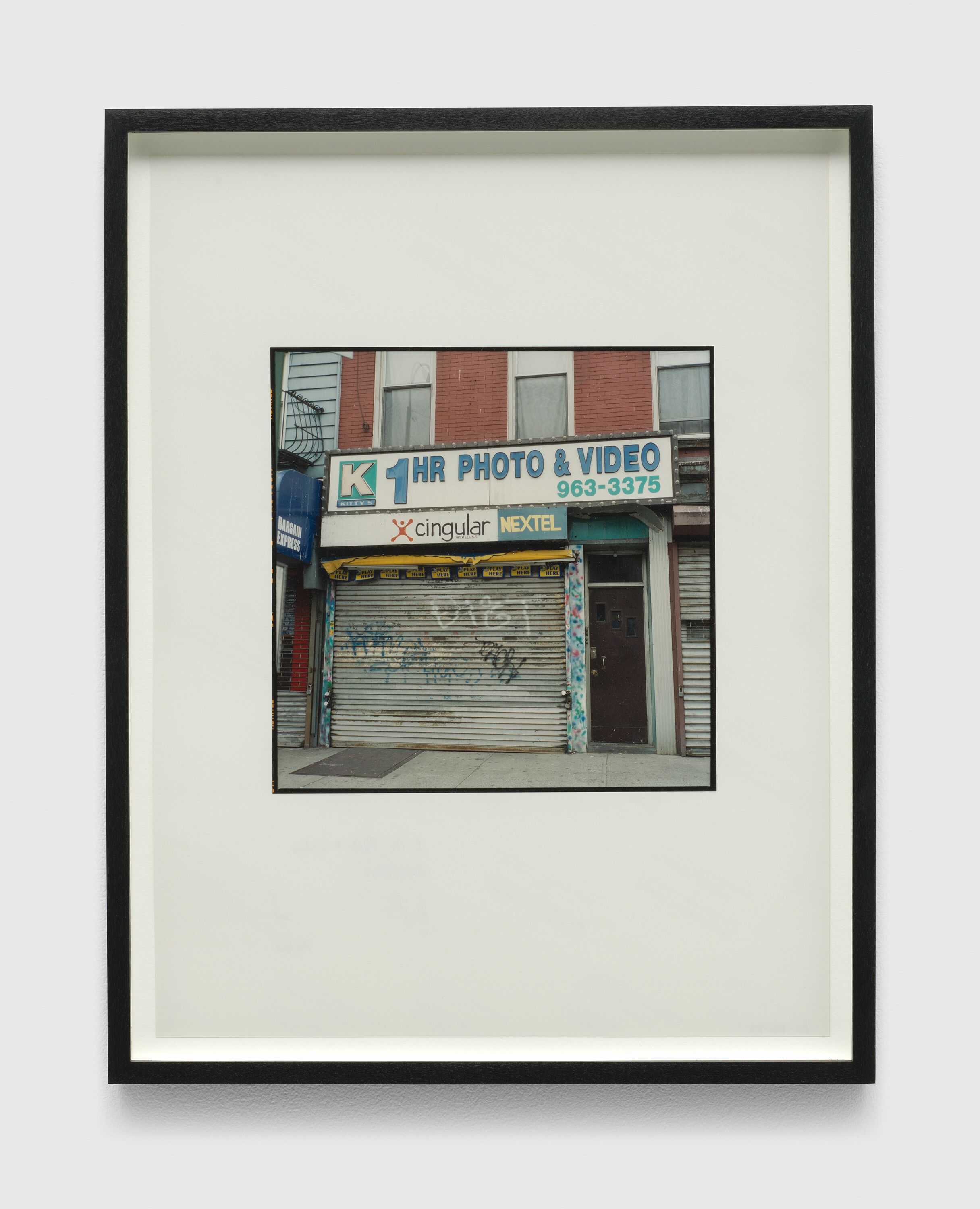 A photograph by Zoe Leonard, titled 1 Hour Photo and Video, dated in 2007 and 2008. 