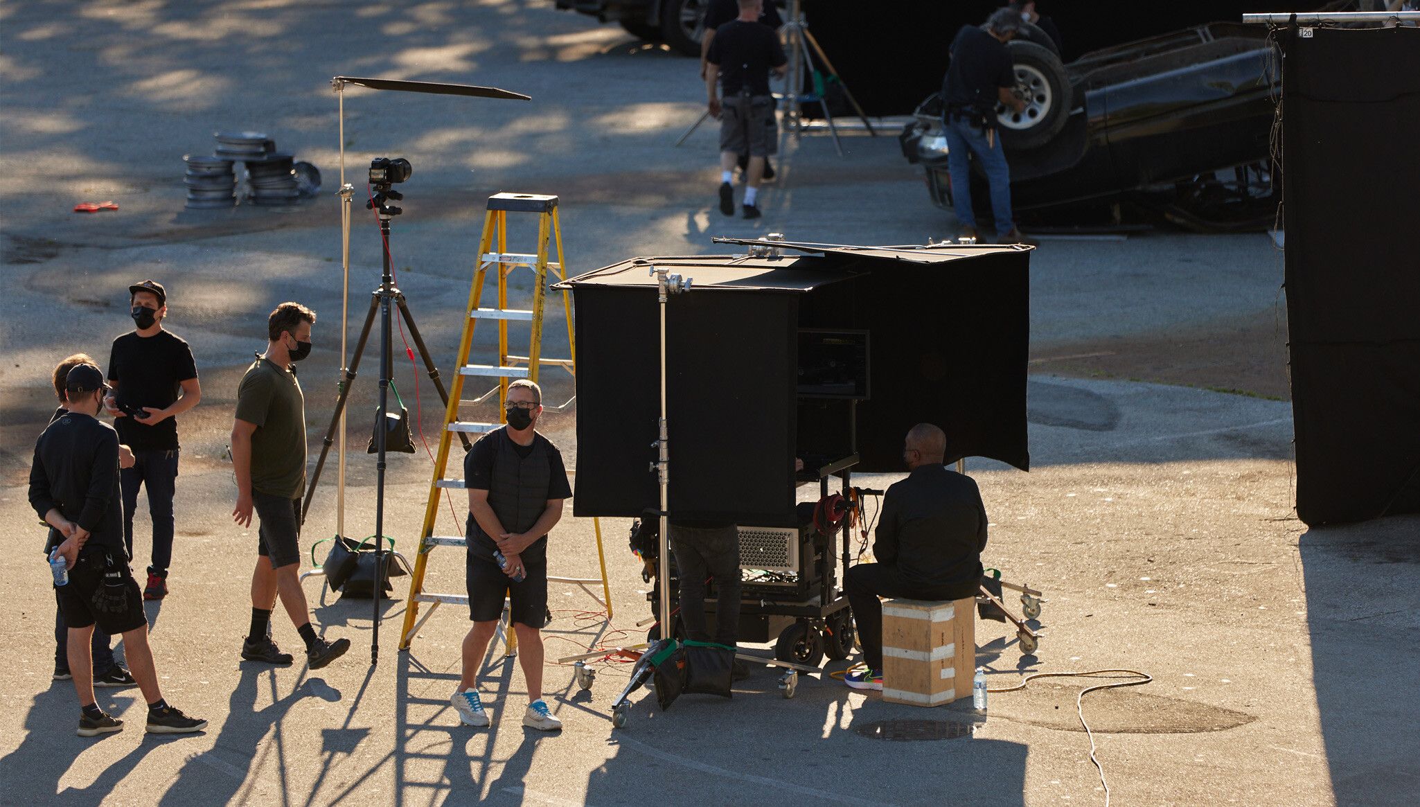 A Photo by Evaan Kheraj of Stan Douglas on set in Vancouver, dated 2021.