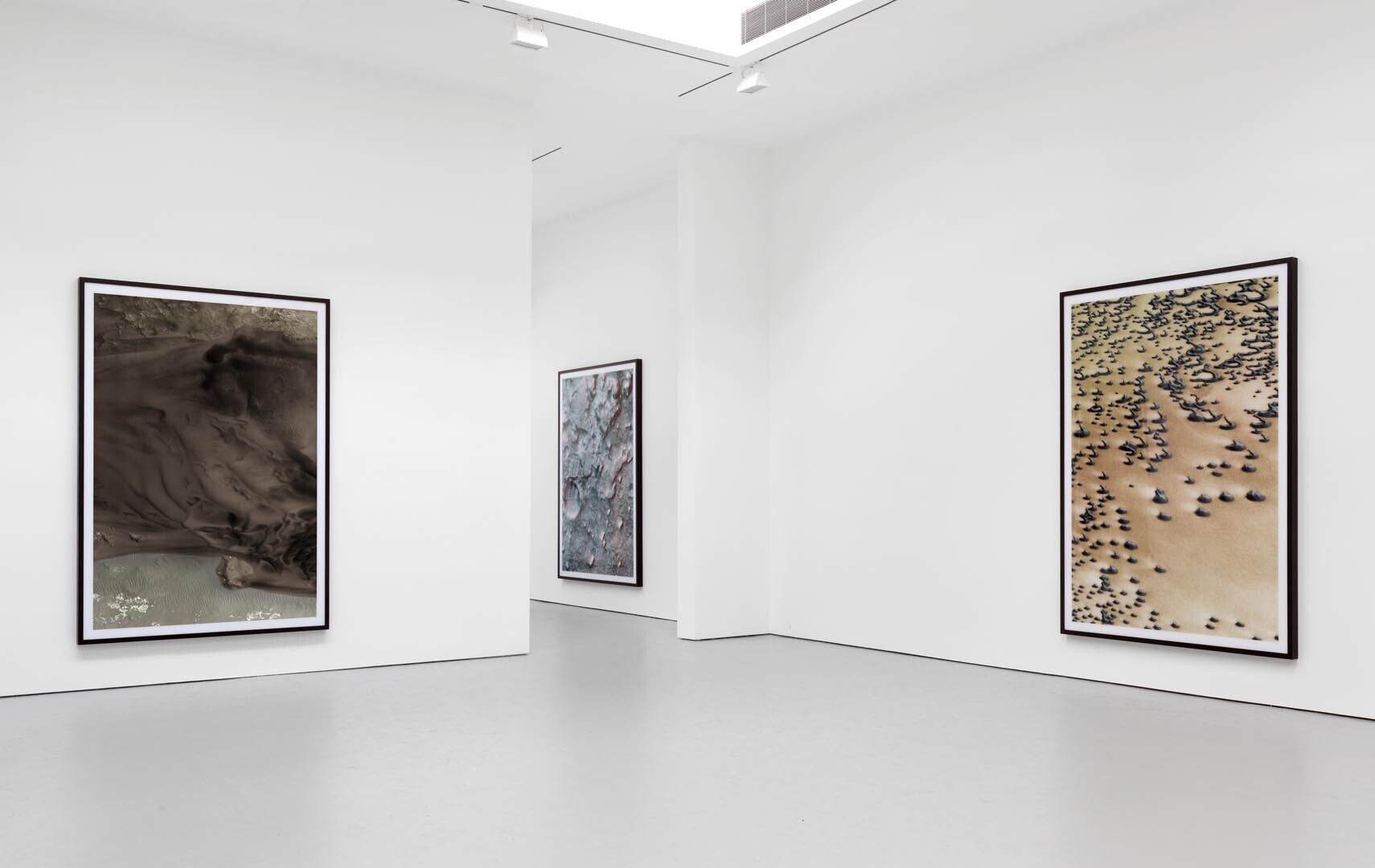 Installation view of the exhibition Thomas Ruff: photograms and ma.r.s., at David Zwirner in New York, dated 2013.